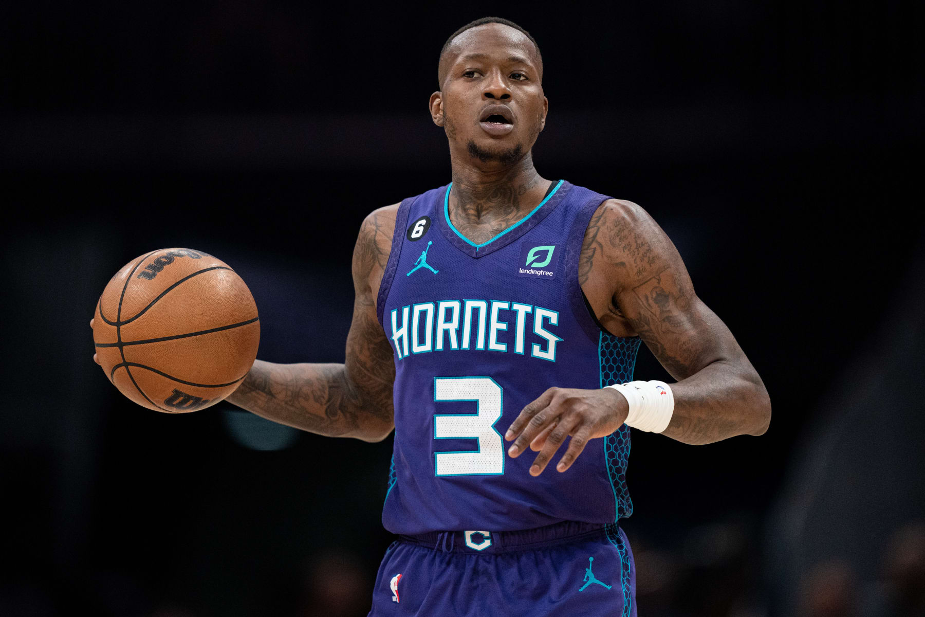 CHARLOTTE, NORTH CAROLINA - JANUARY 14: Terry Rozier #3 of the Charlotte Hornets brings the ball up court against the Boston Celtics during their game at Spectrum Center on January 14, 2023 in Charlotte, North Carolina. NOTE TO USER: User expressly acknowledges and agrees that, by downloading and or using this photograph, User is consenting to the terms and conditions of the Getty Images License Agreement. (Photo by Jacob Kupferman/Getty Images)