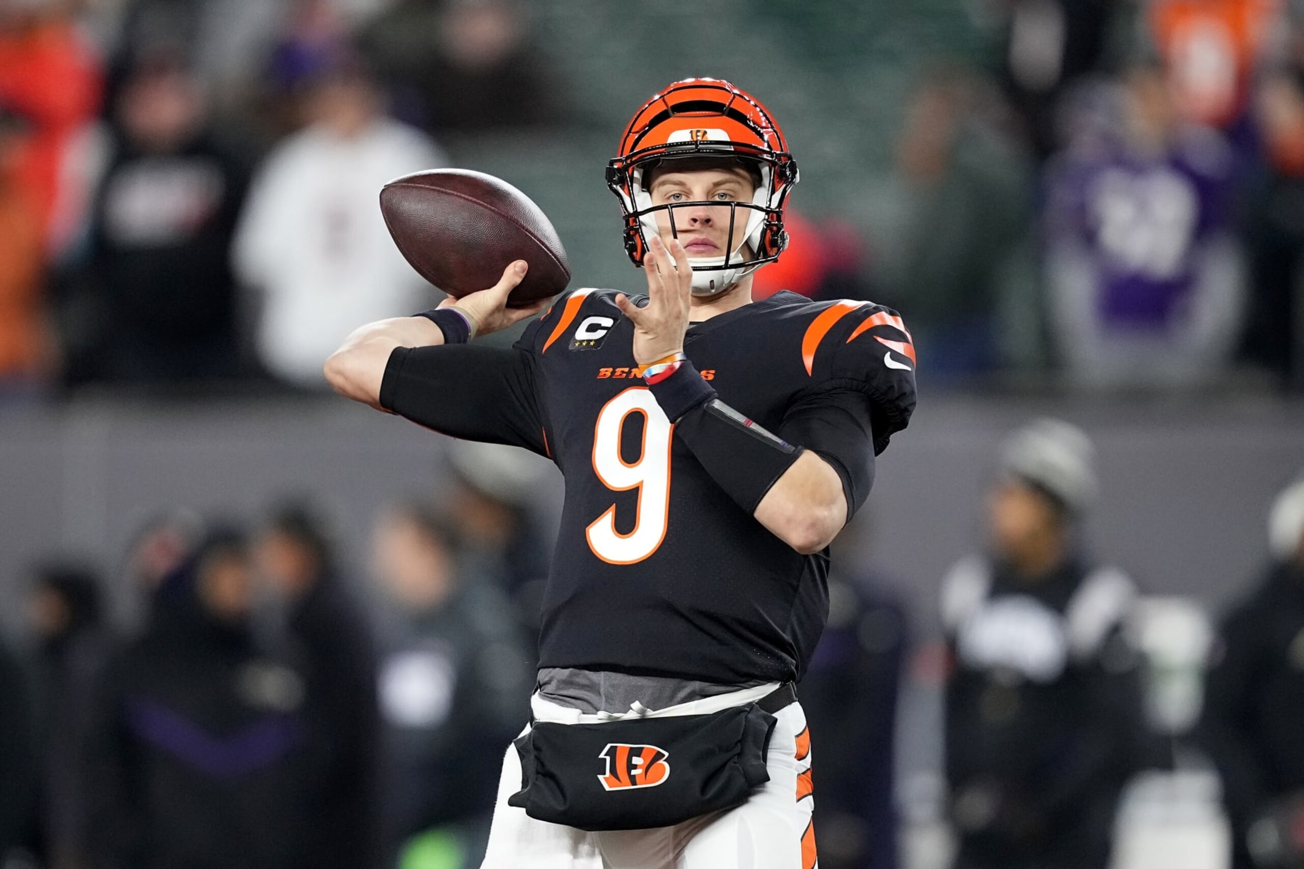 CINCINNATI, OHIO - JANUARY 15: Joe Burrow #9 of the Cincinnati Bengals warms up prior to the AFC Wild Card playoff game against the Baltimore Ravens at Paycor Stadium on January 15, 2023 in Cincinnati, Ohio. (Photo by Dylan Buell/Getty Images) CINCINNATI, OHIO - JANUARY 15: Joe Burrow #9 of the Cincinnati Bengals warms up prior to the AFC Wild Card playoff game against the Baltimore Ravens at Paycor Stadium on January 15, 2023 in Cincinnati, Ohio. (Photo by Dylan Buell/Getty Images)