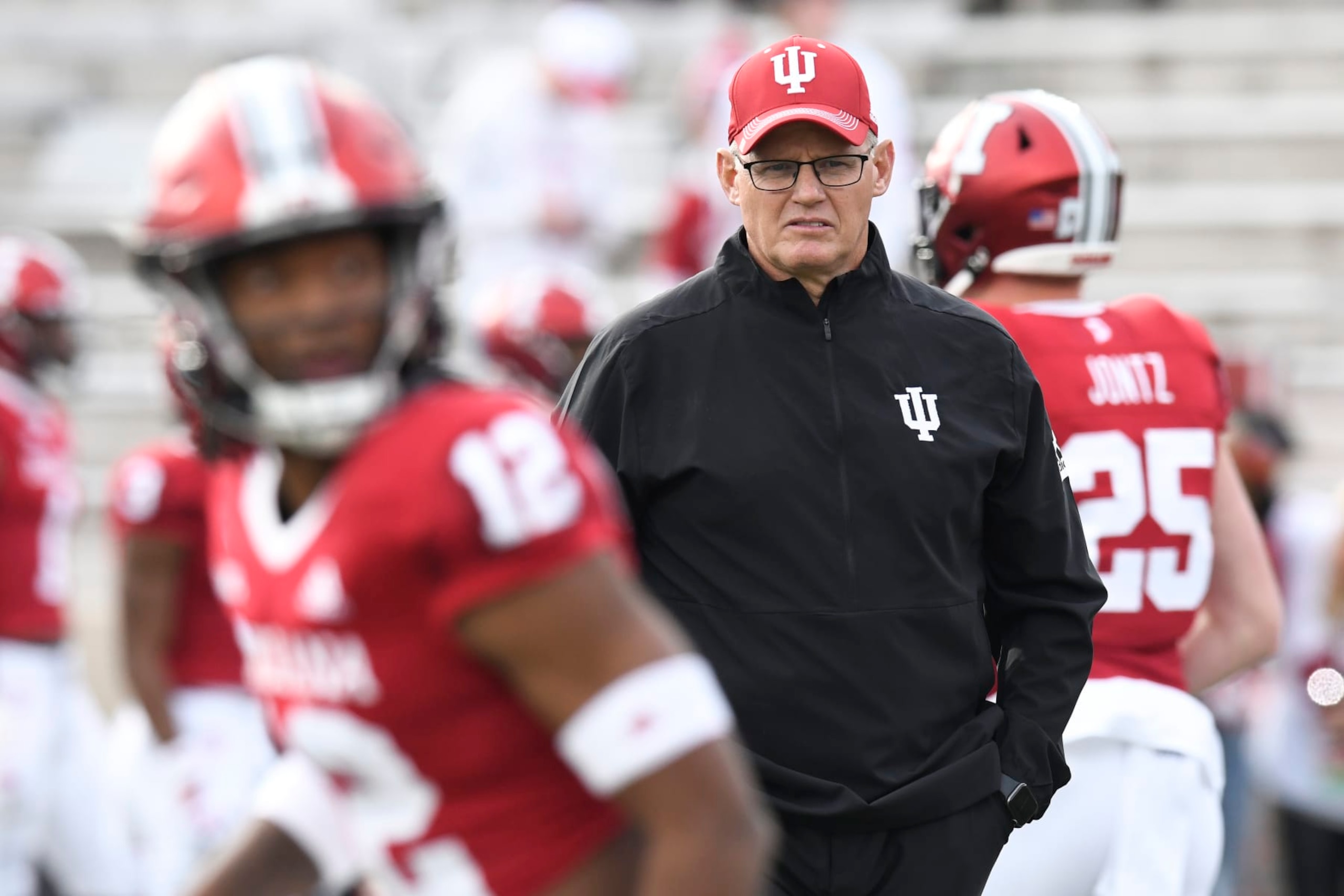 BLOOMINGTON, IN - NOVEMBER 26: Indiana Hoosiers head coach Tom Allen looks on as players warm up for the college football game between the Purdue Boilermakers and the Indiana Hoosiers on November 26, 2022, at Memorial Stadium in Bloomington, Indiana. (Photo by Michael Allio/Icon Sportswire via Getty Images)