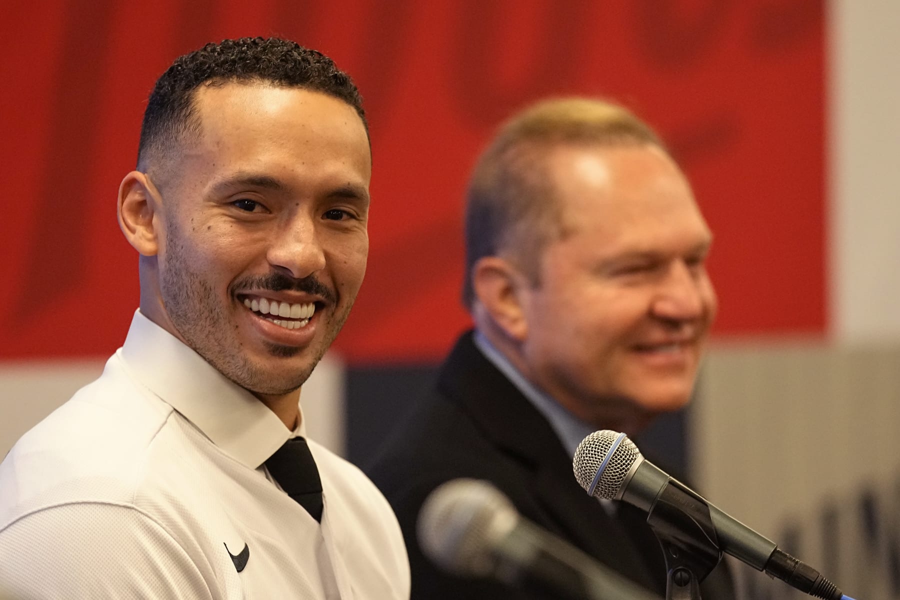 Minnesota Twins baseball player Carlos Correa, left, and Agent Scott Boras speak to the media during a press conference at Target Field Wednesday, Jan. 11, 2023, in Minneapolis. The team and Correa agreed to a six-year, $200 million contract. (AP Photo/Abbie Parr)