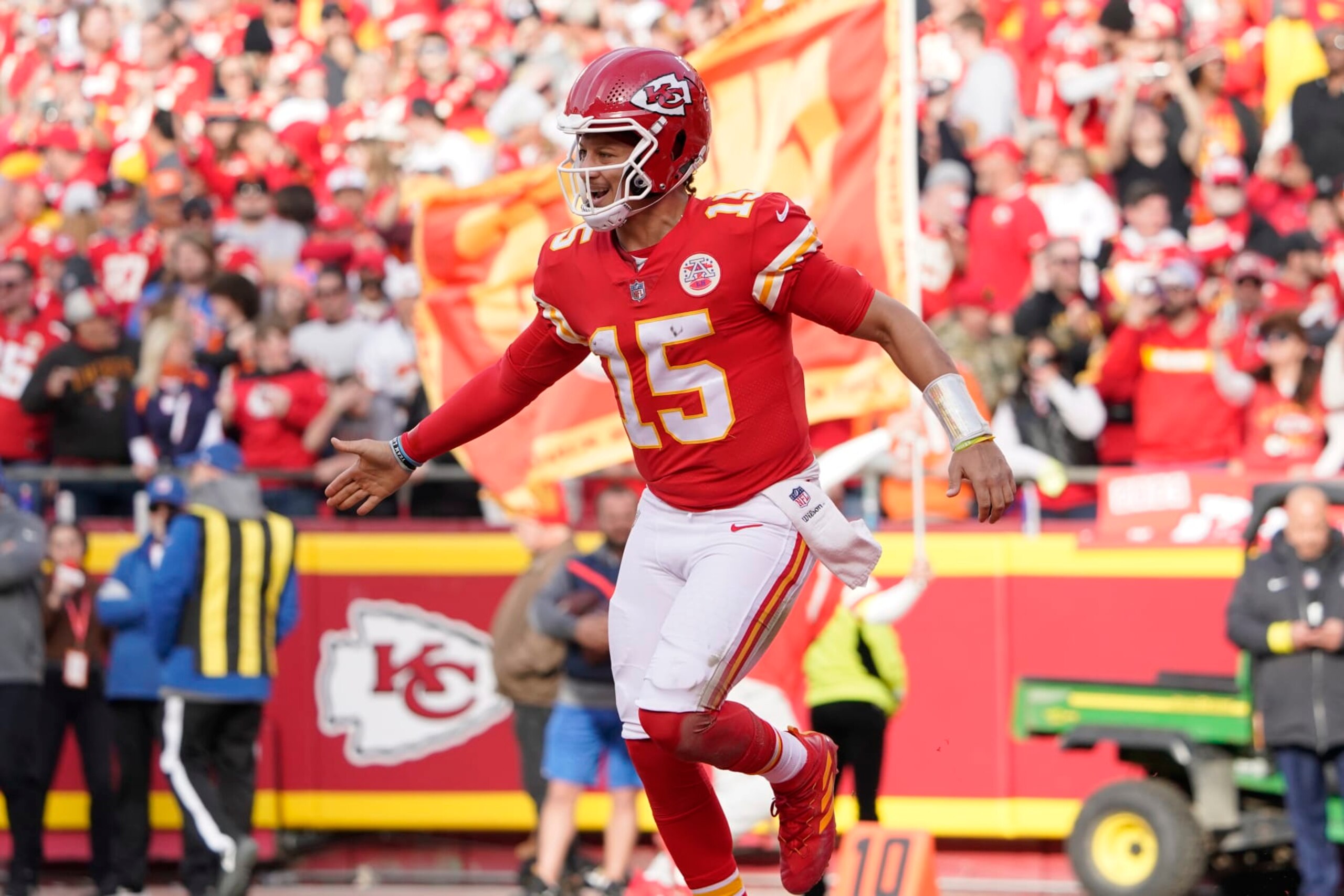 Kansas City Chiefs quarterback Patrick Mahomes celebrates a touchdown against the Denver Broncos during an NFL football game Sunday, Jan. 1, 2023, in Kansas City, Mo. (AP Photo/Ed Zurga)