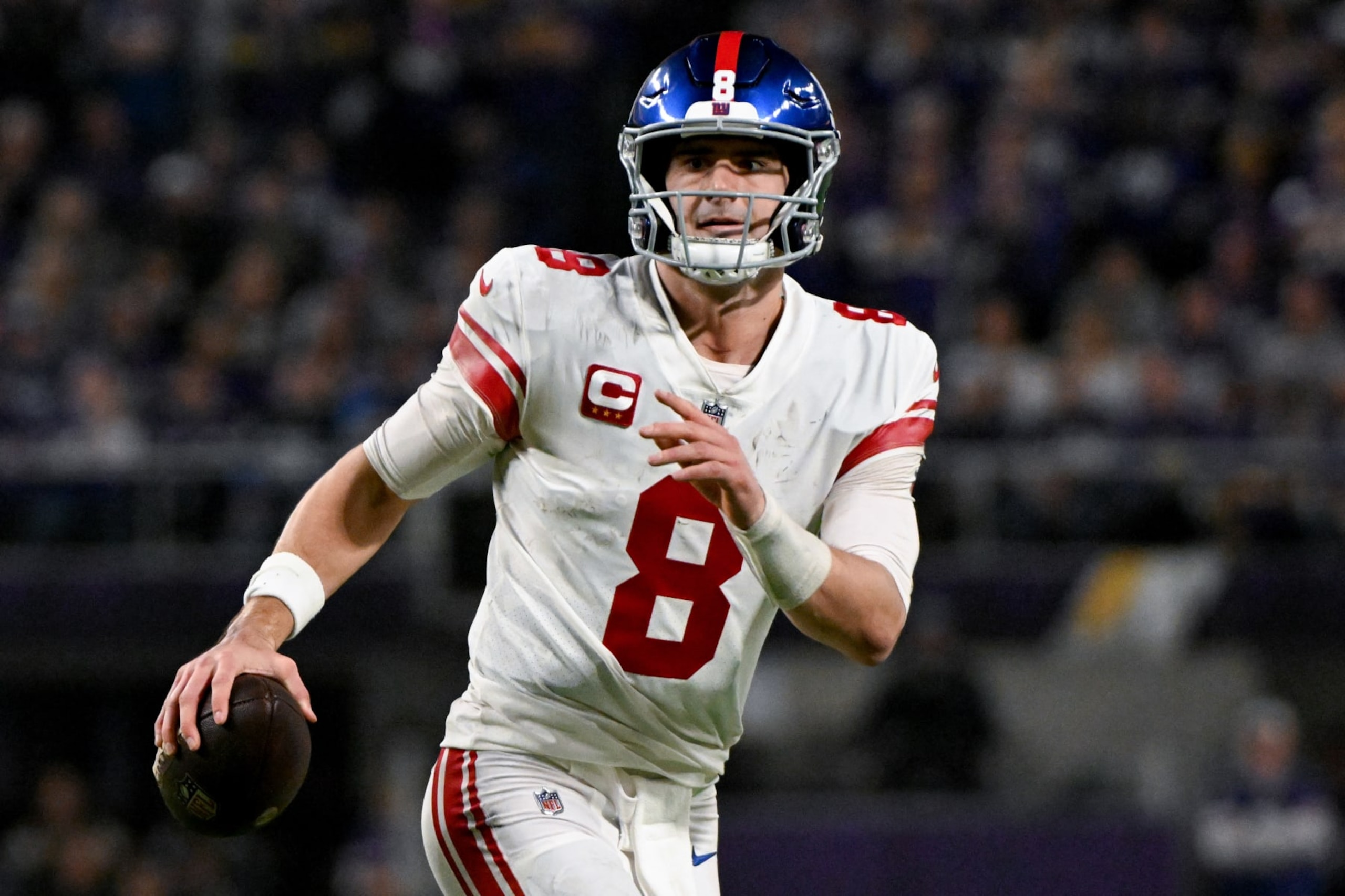 MINNEAPOLIS, MINNESOTA - JANUARY 15: Daniel Jones #8 of the New York Giants looks to pass against the Minnesota Vikings during the first half in the NFC Wild Card playoff game at U.S. Bank Stadium on January 15, 2023 in Minneapolis, Minnesota. (Photo by Stephen Maturen/Getty Images)