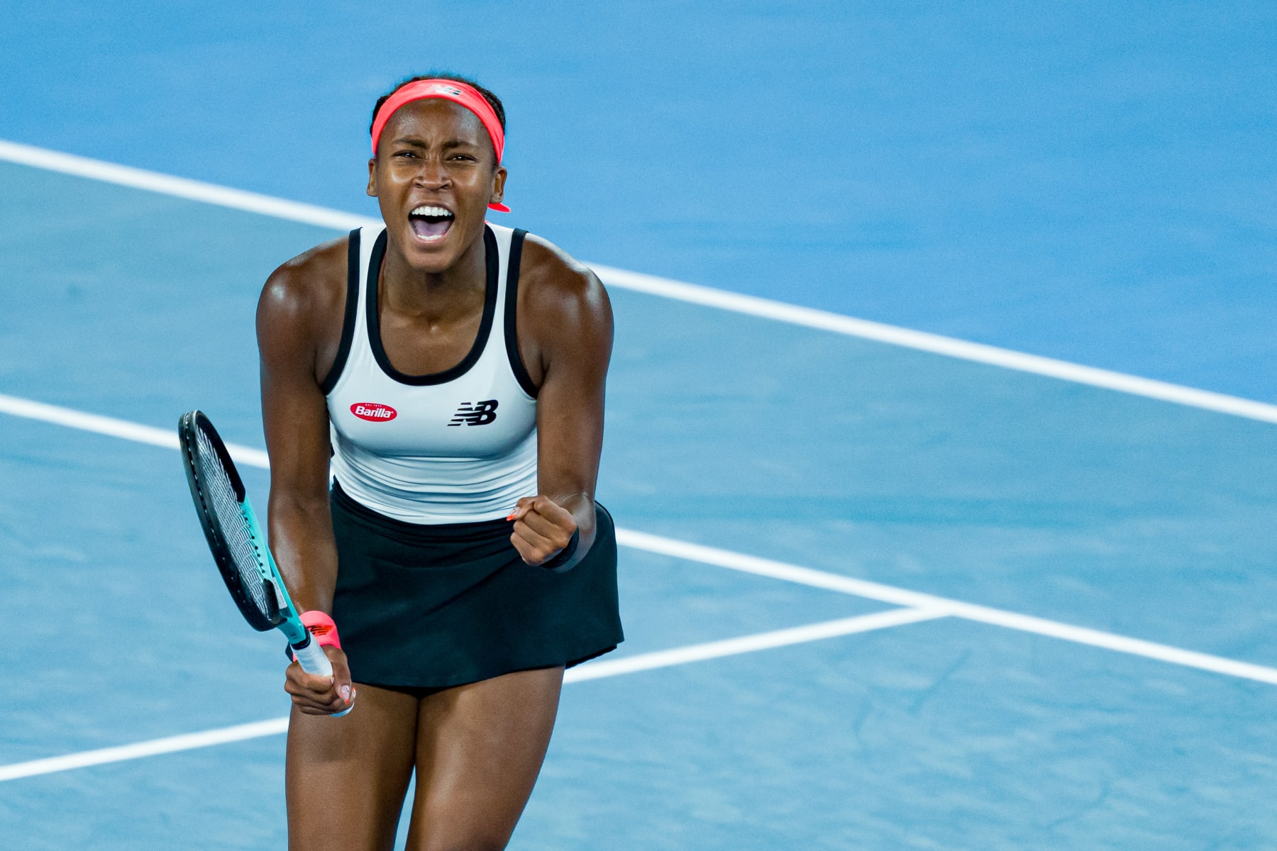 MELBOURNE, AUSTRALIA - JANUARY 18: Coco Gauff of the United States celebrates victory in the round two singles match against Emma Raducanu of Great Britain during day three of the 2023 Australian Open at Melbourne Park on January 18, 2023 in Melbourne, Australia. (Photo by Andy Cheung/Getty Images)