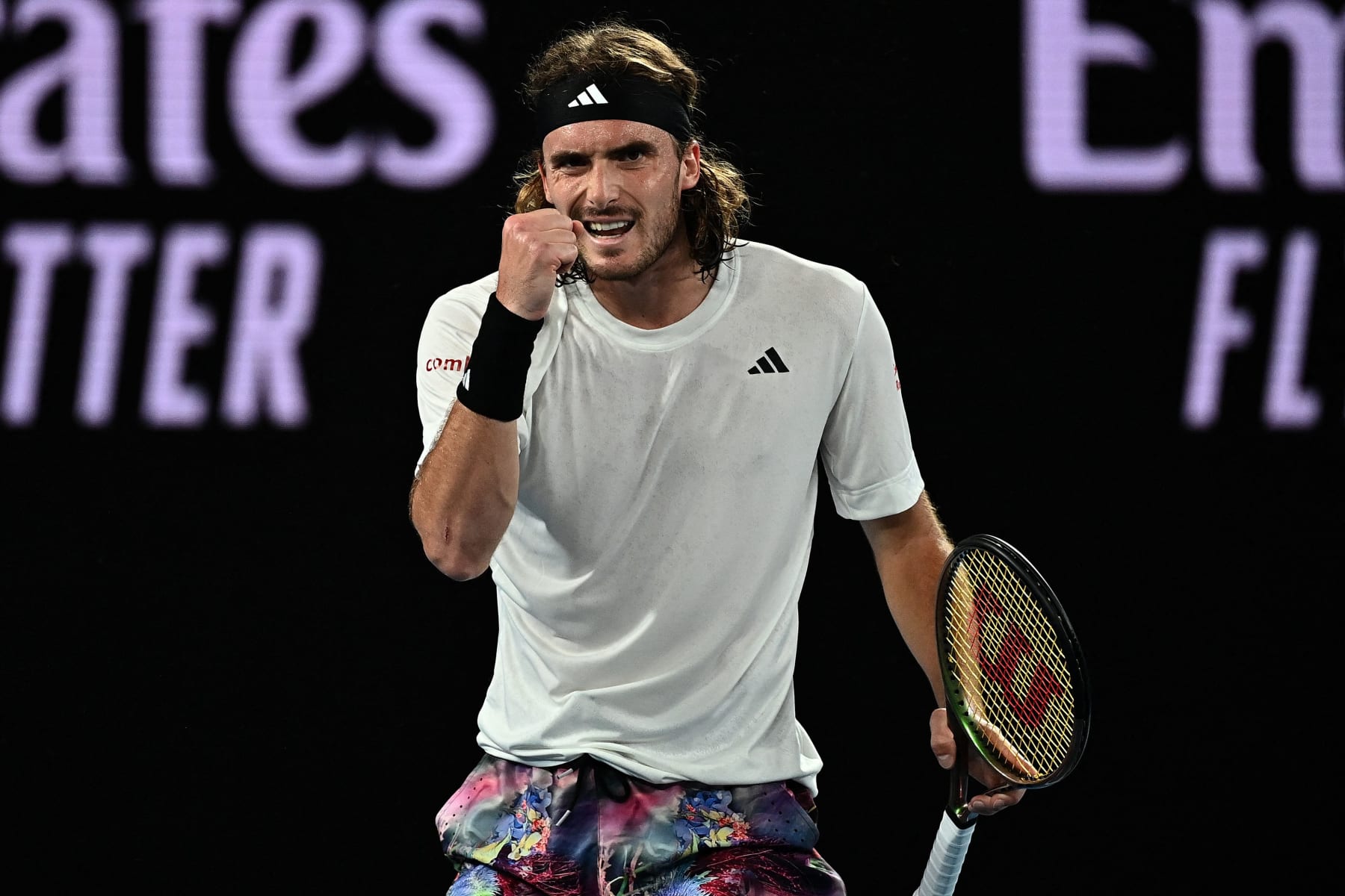 Greece's Stefanos Tsitsipas reacts on a point against Australia's Rinky Hijikata during their men's singles match on day three of the Australian Open tennis tournament in Melbourne on January 18, 2023. - -- IMAGE RESTRICTED TO EDITORIAL USE - STRICTLY NO COMMERCIAL USE -- (Photo by MANAN VATSYAYANA / AFP) / -- IMAGE RESTRICTED TO EDITORIAL USE - STRICTLY NO COMMERCIAL USE -- (Photo by MANAN VATSYAYANA/AFP via Getty Images)