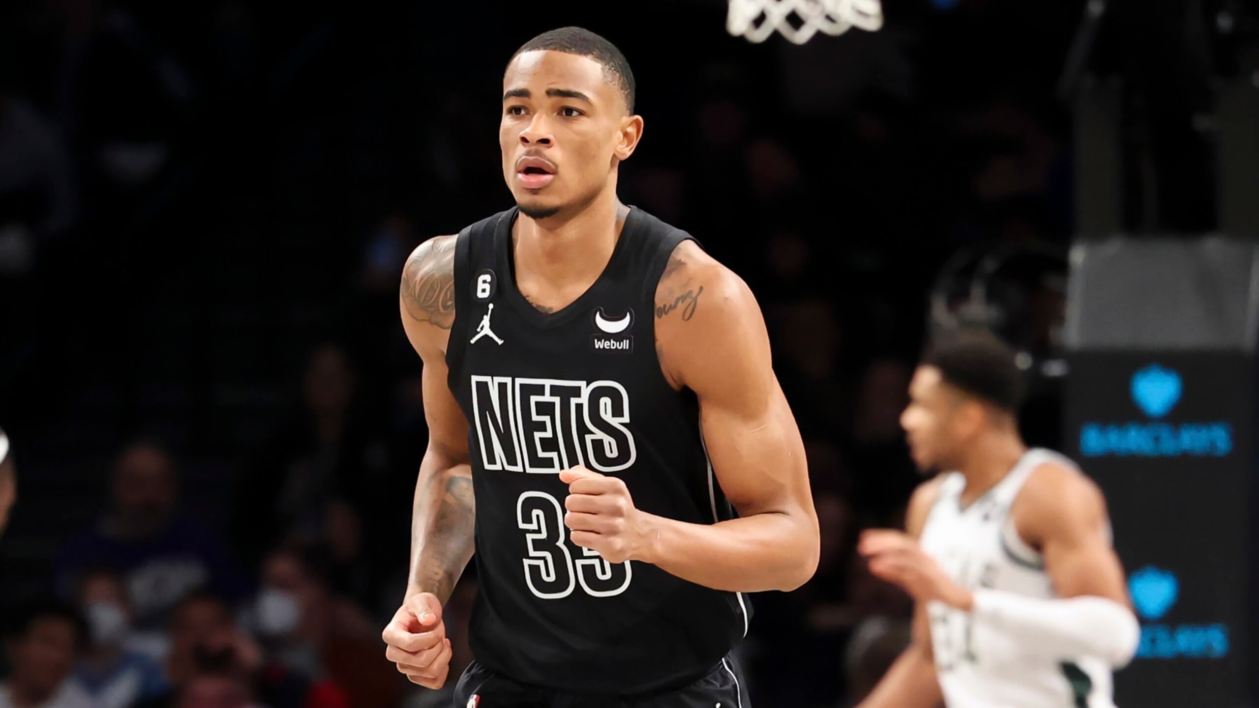 Brooklyn Nets center Nic Claxton (33) runs down the court during the first half of an NBA basketball game against the Milwaukee Bucks, Friday, Dec. 23, 2022, in New York. (AP Photo/Jessie Alcheh)