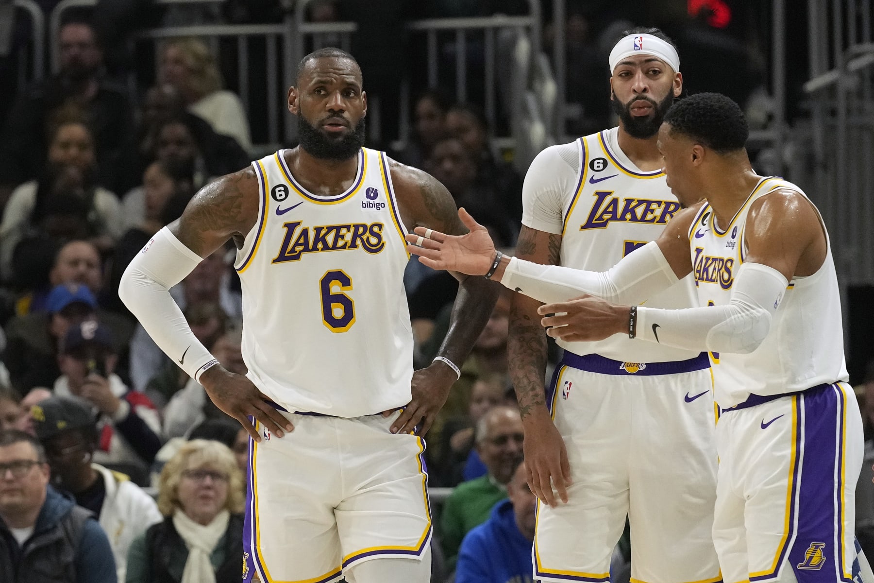 MILWAUKEE, WISCONSIN - DECEMBER 02: LeBron James #6, Anthony Davis #3 and Russell Westbrook #0 of the Los Angeles Lakers talk during the first half against the Milwaukee Bucks at Fiserv Forum on December 02, 2022 in Milwaukee, Wisconsin. NOTE TO USER: User expressly acknowledges and agrees that, by downloading and or using this photograph, User is consenting to the terms and conditions of the Getty Images License Agreement. (Photo by Patrick McDermott/Getty Images)
