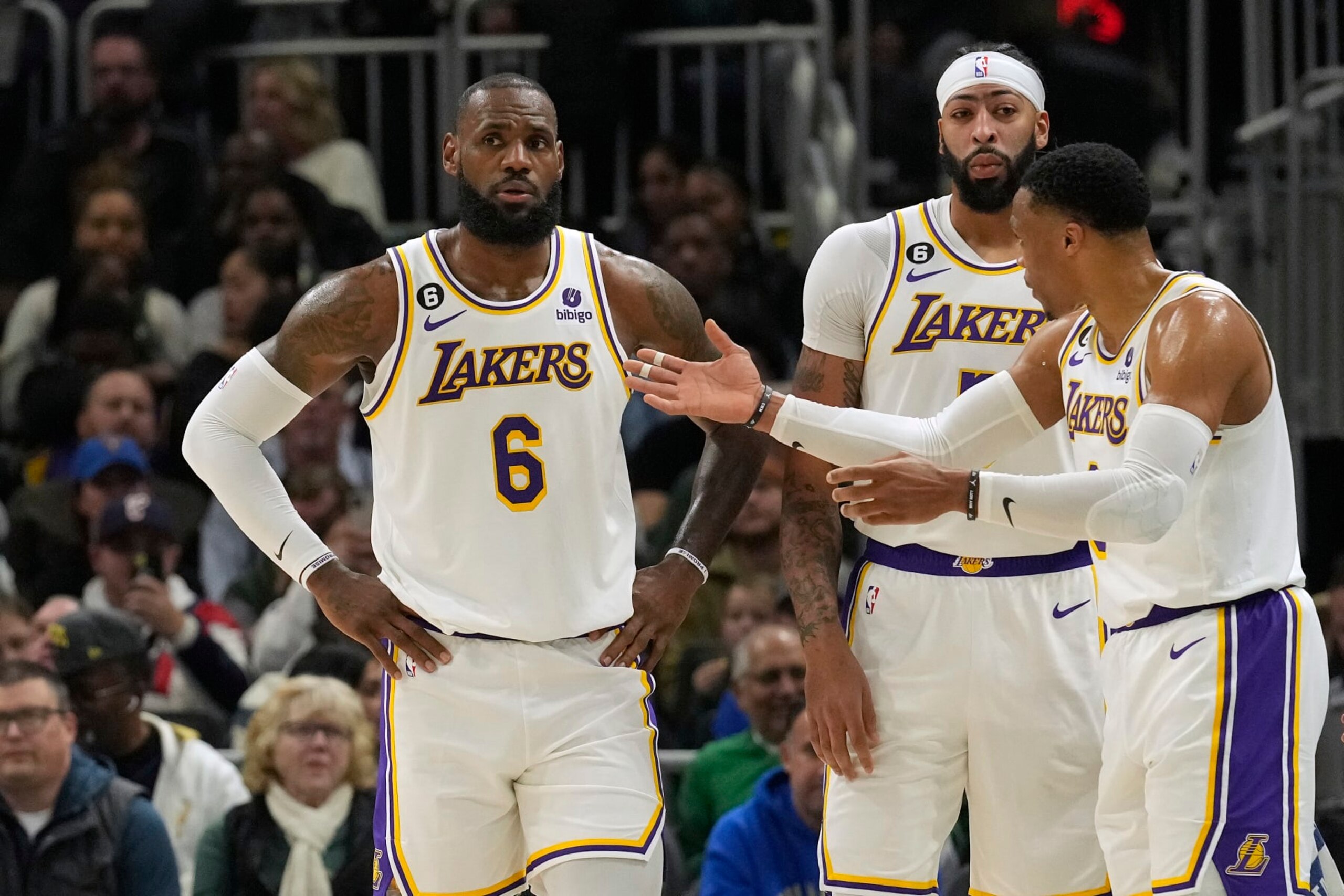 MILWAUKEE, WISCONSIN - DECEMBER 02: LeBron James #6, Anthony Davis #3 and Russell Westbrook #0 of the Los Angeles Lakers talk during the first half against the Milwaukee Bucks at Fiserv Forum on December 02, 2022 in Milwaukee, Wisconsin. NOTE TO USER: User expressly acknowledges and agrees that, by downloading and or using this photograph, User is consenting to the terms and conditions of the Getty Images License Agreement. (Photo by Patrick McDermott/Getty Images)