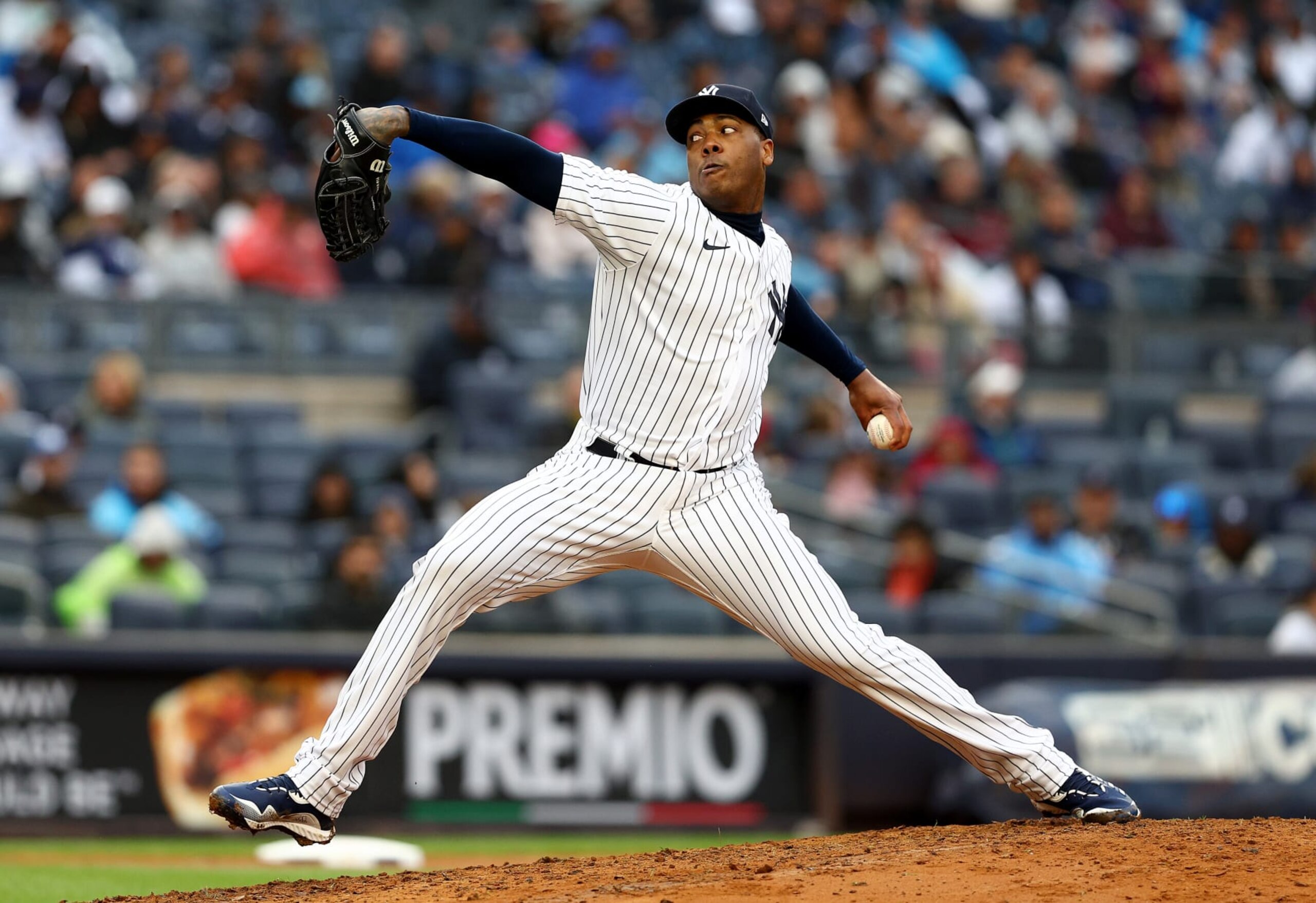 NEW YORK, NEW YORK - OCTOBER 02: Aroldis Chapman #54 of the New York Yankees delivers a pitch in the seventh inning against the Baltimore Orioles at Yankee Stadium on October 02, 2022 in the Bronx borough of New York City. (Photo by Elsa/Getty Images) NEW YORK, NEW YORK - OCTOBER 02: Aroldis Chapman #54 of the New York Yankees delivers a pitch in the seventh inning against the Baltimore Orioles at Yankee Stadium on October 02, 2022 in the Bronx borough of New York City. (Photo by Elsa/Getty Images)