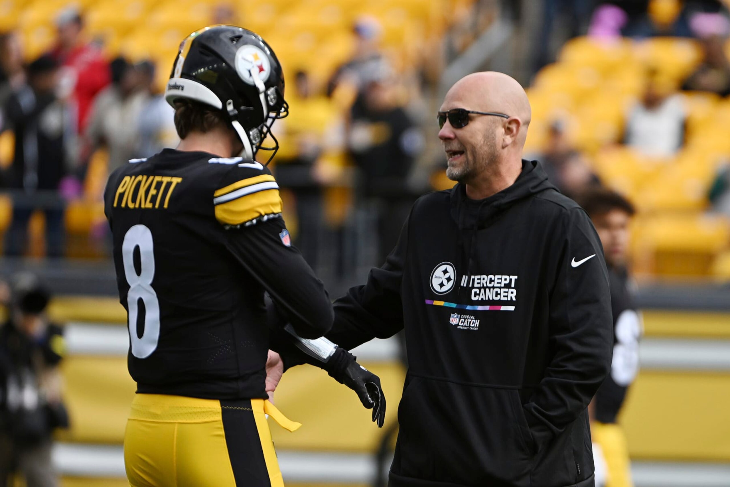 Pittsburgh Steelers offensive coordinator Matt Canada, right, talks with quarterback Kenny Pickett (8) during warm ups before an NFL football game against the Tampa Bay Buccaneers in Pittsburgh, Sunday, Oct. 16, 2022. (AP Photo/Barry Reeger) Pittsburgh Steelers offensive coordinator Matt Canada, right, talks with quarterback Kenny Pickett (8) during warm ups before an NFL football game against the Tampa Bay Buccaneers in Pittsburgh, Sunday, Oct. 16, 2022. (AP Photo/Barry Reeger)