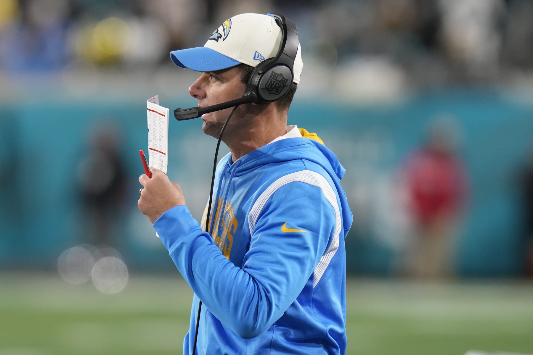 Los Angeles Chargers head coach Brandon Staley speaks on the sidelines during the first half of an NFL wild-card football game against the Jacksonville Jaguars, Saturday, Jan. 14, 2023, in Jacksonville, Fla. (AP Photo/Chris O'Meara)