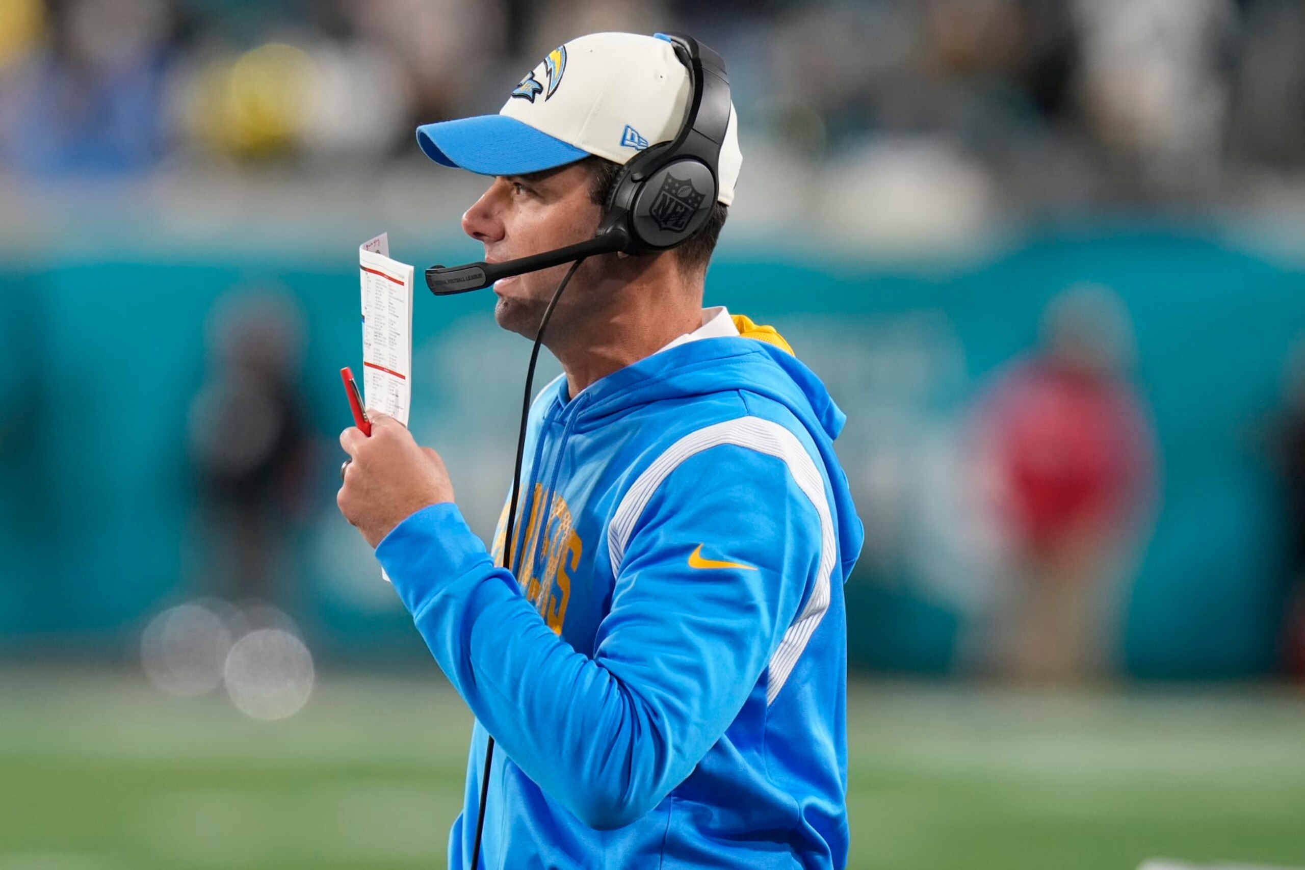 Los Angeles Chargers head coach Brandon Staley speaks on the sidelines during the first half of an NFL wild-card football game against the Jacksonville Jaguars, Saturday, Jan. 14, 2023, in Jacksonville, Fla. (AP Photo/Chris O'Meara)