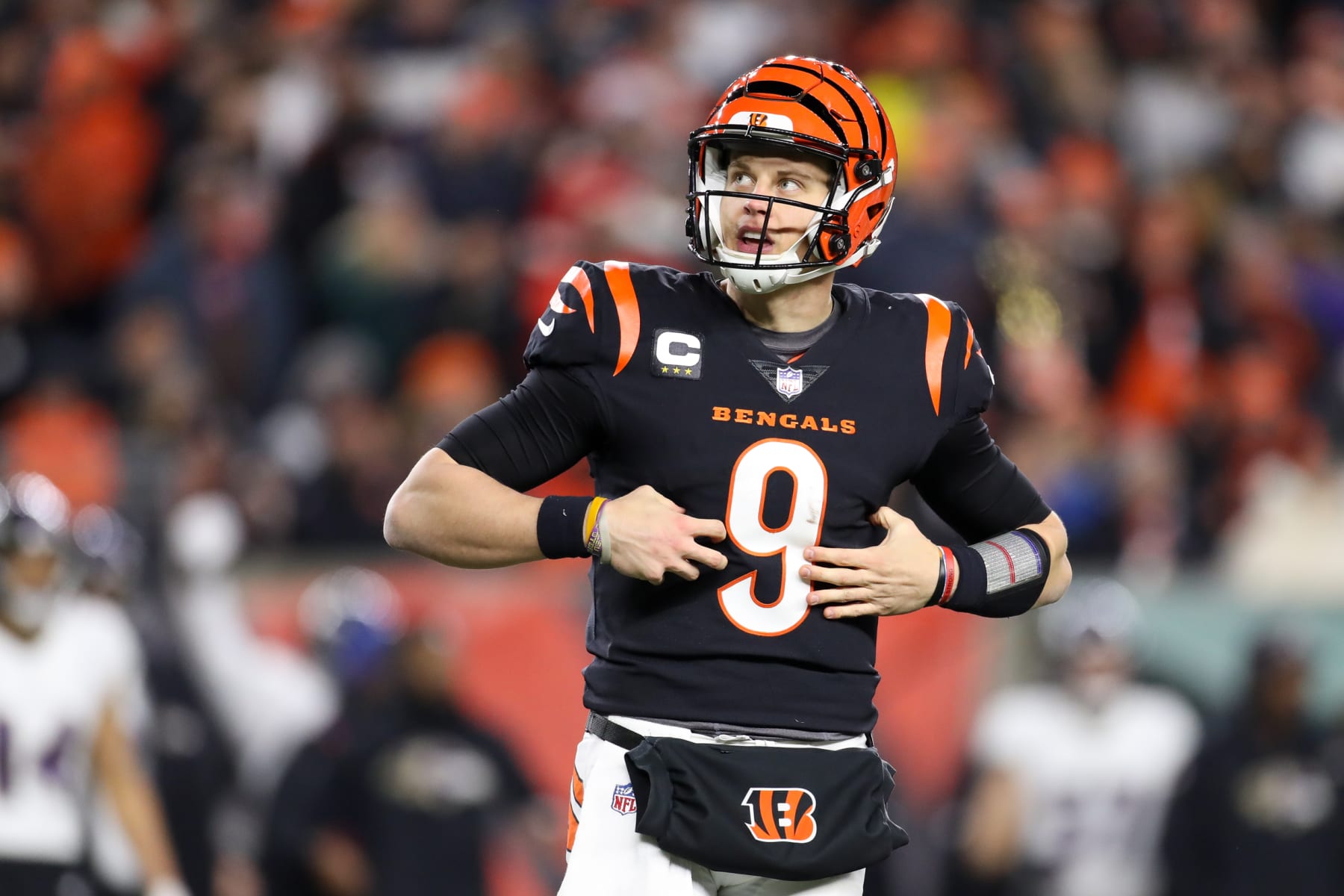 CINCINNATI, OH - JANUARY 15: Cincinnati Bengals quarterback Joe Burrow (9) looks at the scoreboard during the game against the Baltimore Ravens and the Cincinnati Bengals on January 15, 2023, at Paycor Stadium in Cincinnati, OH. (Photo by Ian Johnson/Icon Sportswire via Getty Images)