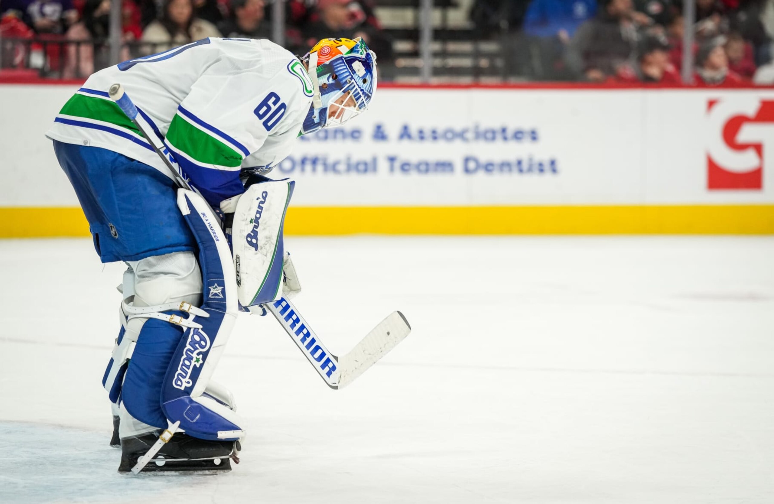 RALEIGH, NORTH CAROLINA - JANUARY 15: Collin Delia #60 of the Vancouver Canucks tends net during the second period against the Carolina Hurricanes at PNC Arena on January 15, 2023 in Raleigh, North Carolina. (Photo by Josh Lavallee/NHLI via Getty Images)
