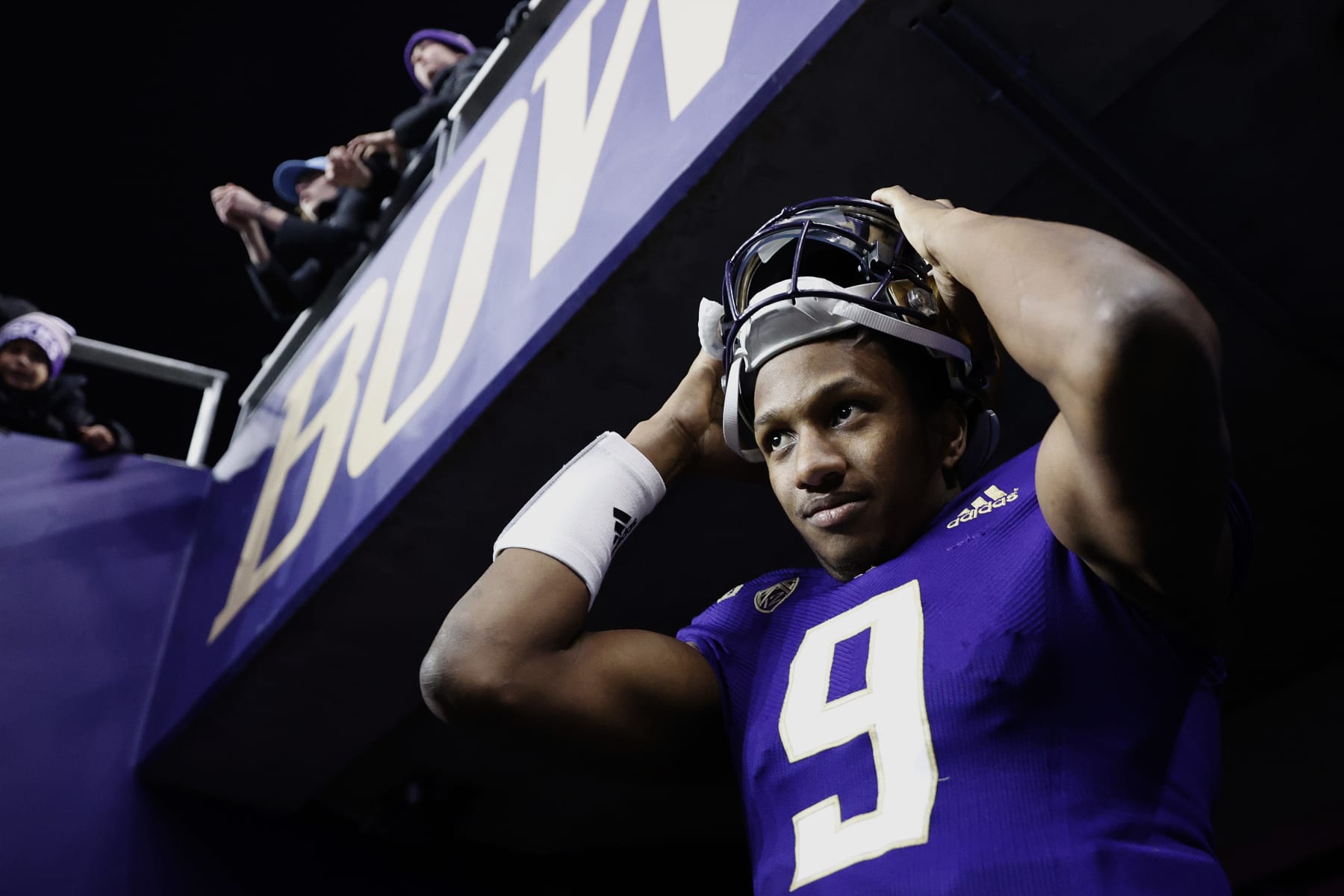 SEATTLE, WASHINGTON - NOVEMBER 19: Michael Penix Jr. #9 of the Washington Huskies reacts after beating Colorado Buffaloes 54-7 at Husky Stadium on November 19, 2022 in Seattle, Washington. (Photo by Steph Chambers/Getty Images)