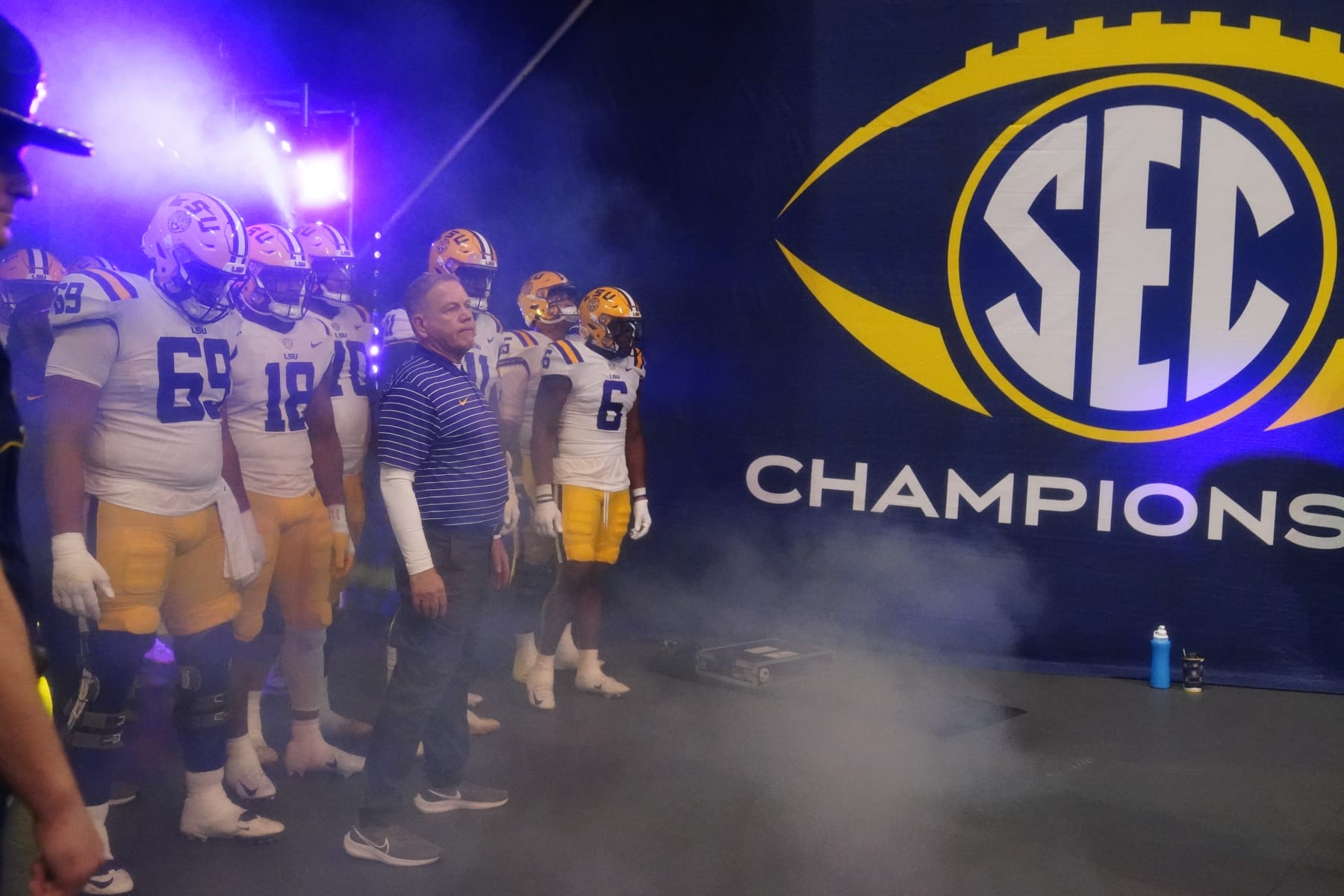 LSU head coach Brian Kelly and the team wait to enter the field before the Southeastern Conference championship NCAA college football game against Georgia, Saturday, Dec. 3, 2022, in Atlanta. (AP Photo/Brynn Anderson)