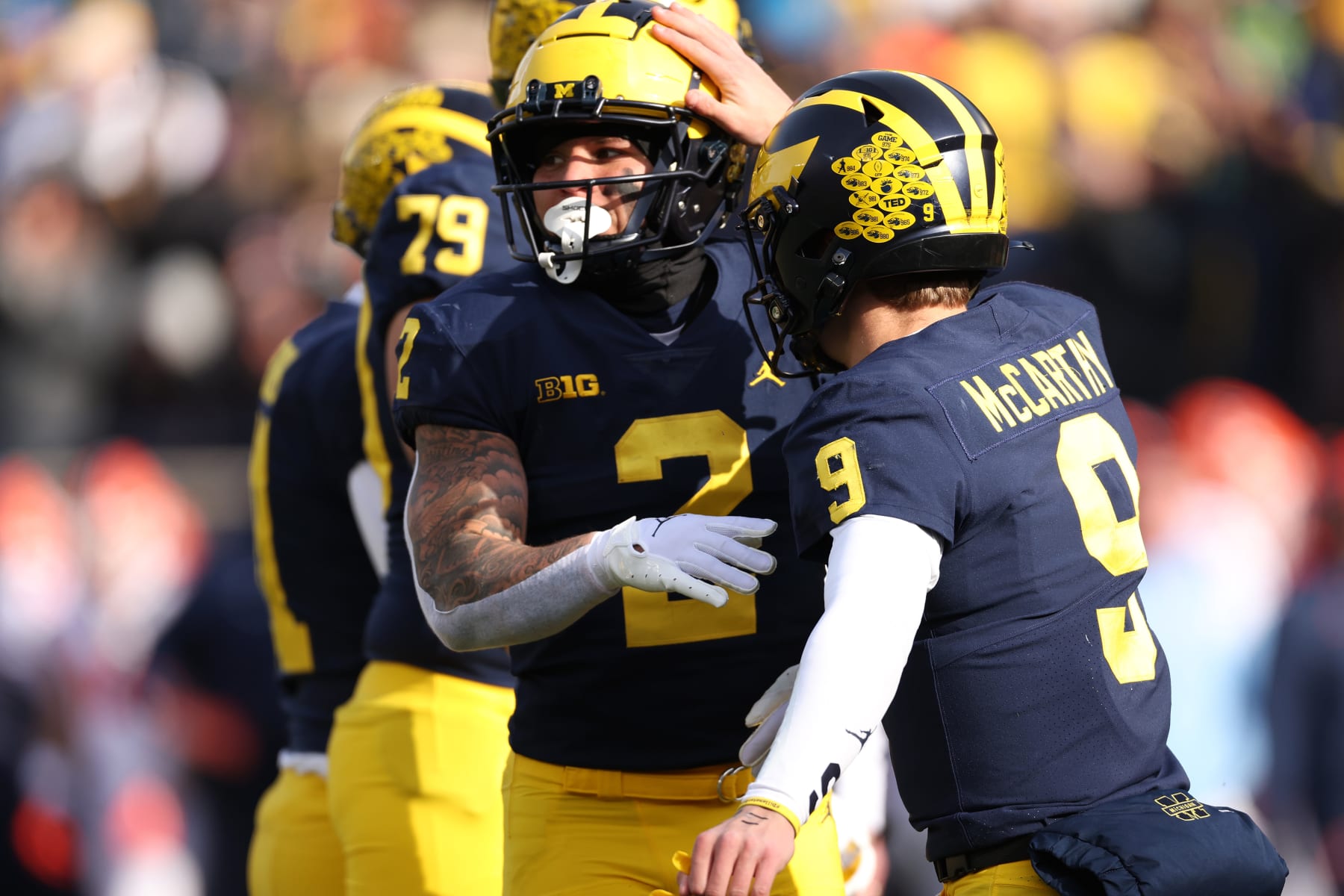 ANN ARBOR, MICHIGAN - NOVEMBER 19: Blake Corum #2 of the Michigan Wolverines celebrates his first half touchdown with J.J. McCarthy #9 while playing the Illinois Fighting Illini at Michigan Stadium on November 19, 2022 in Ann Arbor, Michigan. (Photo by Gregory Shamus/Getty Images)