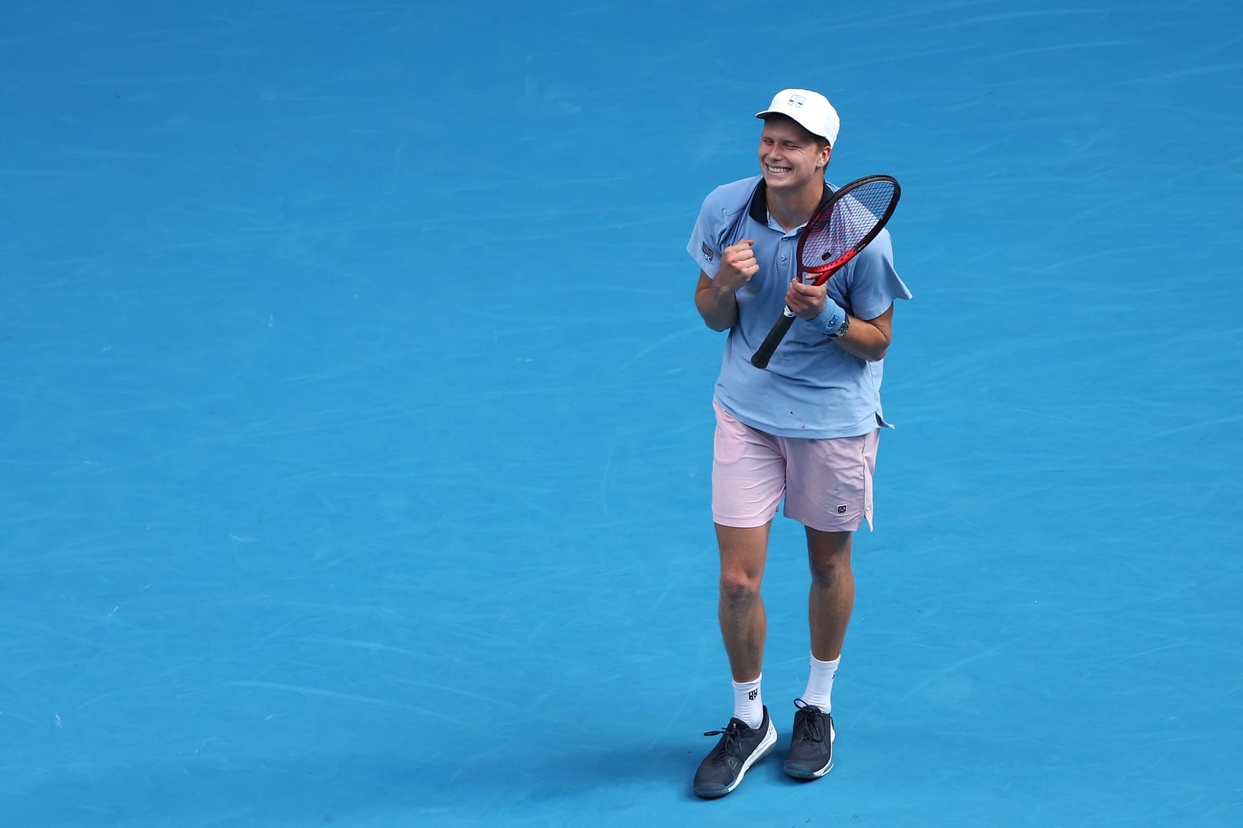 MELBOURNE, AUSTRALIA - JANUARY 19: Jenson Brooksby of the United States celebrates match point in their round two singles match against Casper Ruud of Norway during day four of the 2023 Australian Open at Melbourne Park on January 19, 2023 in Melbourne, Australia. (Photo by Mark Kolbe/Getty Images)
