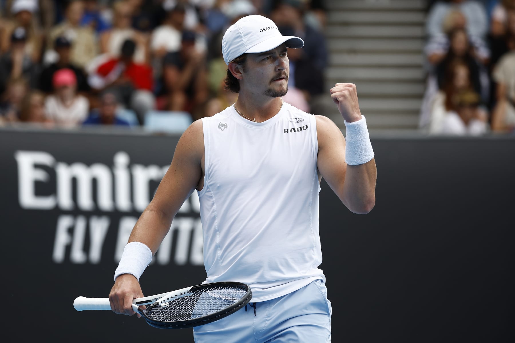 MELBOURNE, AUSTRALIA - JANUARY 19: J.J. Wolf of the United States reacts in their round two singles match against Diego Schwartzman of Argentina during day four of the 2023 Australian Open at Melbourne Park on January 19, 2023 in Melbourne, Australia. (Photo by Daniel Pockett/Getty Images)