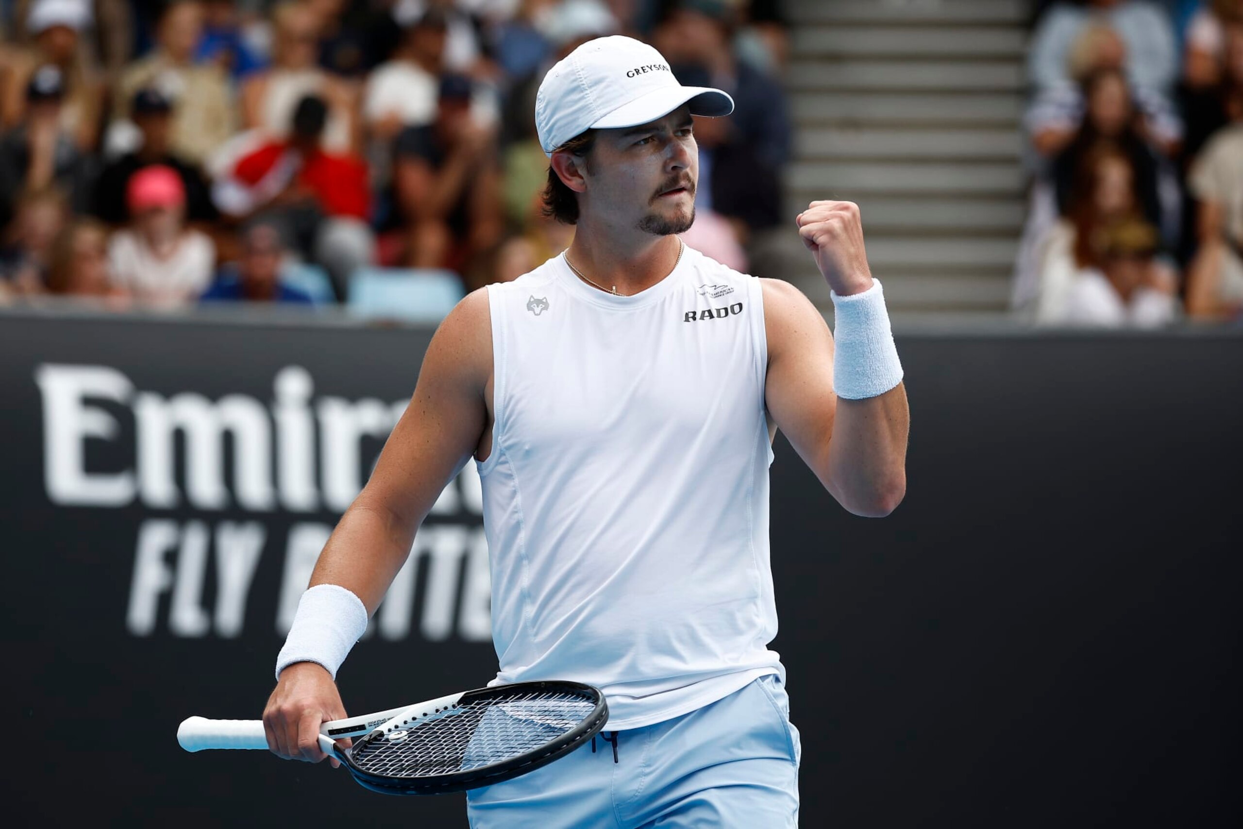 MELBOURNE, AUSTRALIA - JANUARY 19: J.J. Wolf of the United States reacts in their round two singles match against Diego Schwartzman of Argentina during day four of the 2023 Australian Open at Melbourne Park on January 19, 2023 in Melbourne, Australia. (Photo by Daniel Pockett/Getty Images) MELBOURNE, AUSTRALIA - JANUARY 19: J.J. Wolf of the United States reacts in their round two singles match against Diego Schwartzman of Argentina during day four of the 2023 Australian Open at Melbourne Park on January 19, 2023 in Melbourne, Australia. (Photo by Daniel Pockett/Getty Images)