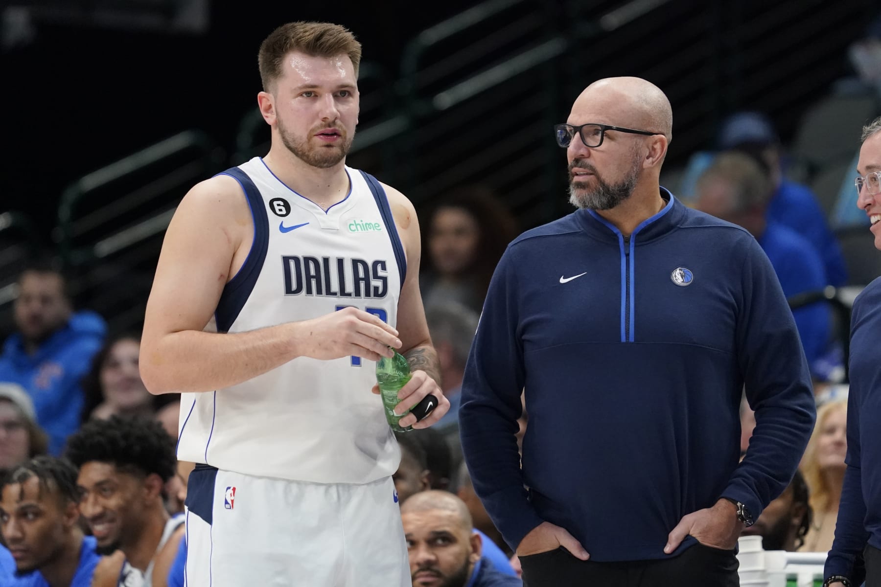 DALLAS, TEXAS - JANUARY 07: Luka Doncic #77 of the Dallas Mavericks and head coach Jason Kidd talk on the court during the first half of the game against the New Orleans Pelicans at American Airlines Center on January 07, 2023 in Dallas, Texas. NOTE TO USER: User expressly acknowledges and agrees that, by downloading and or using this photograph, User is consenting to the terms and conditions of the Getty Images License Agreement. (Photo by Sam Hodde/Getty Images)