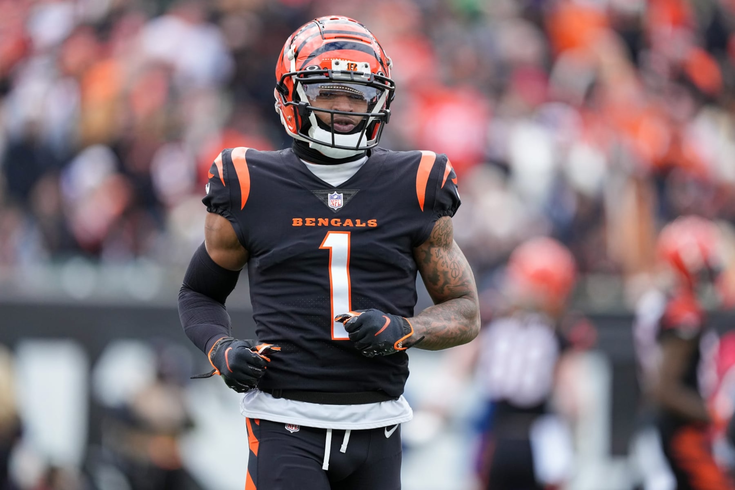 CINCINNATI, OHIO - JANUARY 08: Ja'Marr Chase #1 of the Cincinnati Bengals lines up for a play in the first quarter against the Baltimore Ravens at Paycor Stadium on January 08, 2023 in Cincinnati, Ohio. (Photo by Dylan Buell/Getty Images)