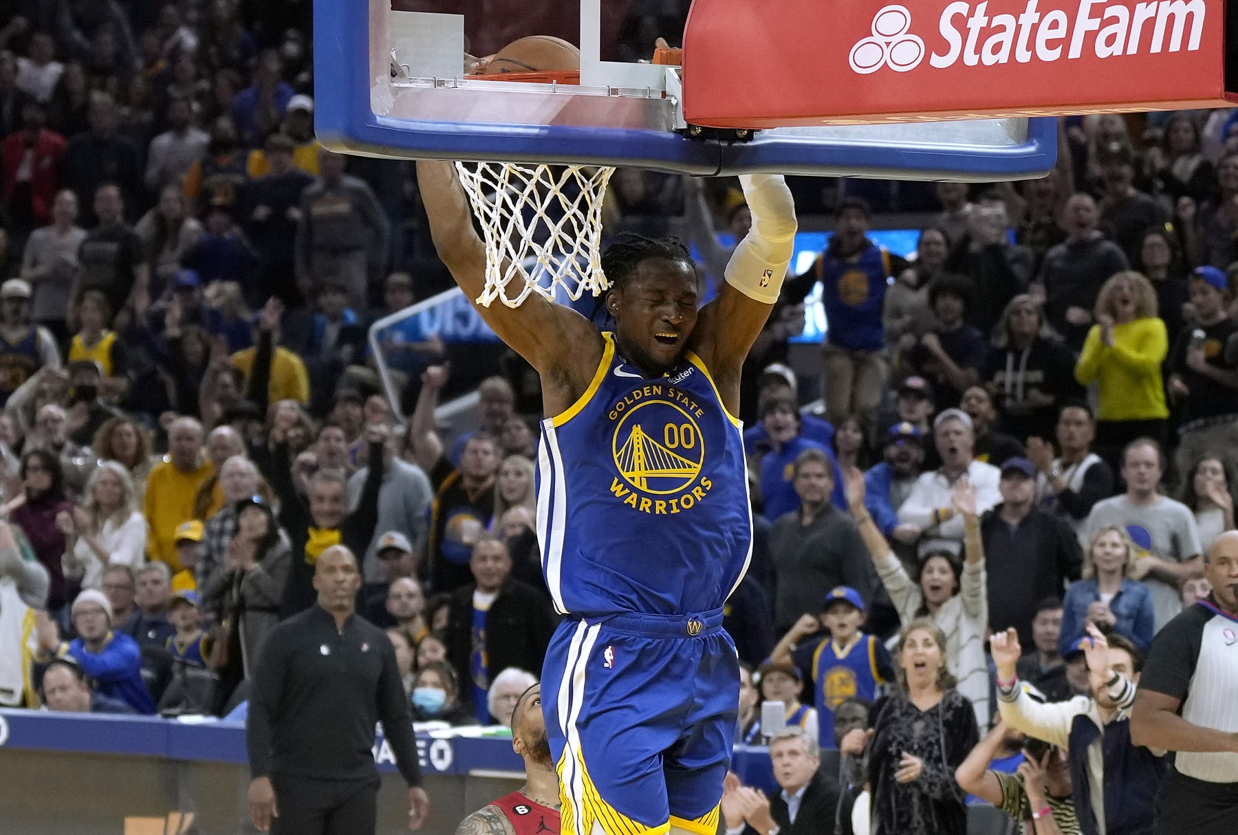 SAN FRANCISCO, CALIFORNIA - DECEMBER 30: Jonathan Kuminga #00 of the Golden State Warriors slam dunk against the Portland Trail Blazers during the fourth quarter at Chase Center on December 30, 2022 in San Francisco, California. NOTE TO USER: User expressly acknowledges and agrees that, by downloading and or using this photograph, User is consenting to the terms and conditions of the Getty Images License Agreement. (Photo by Thearon W. Henderson/Getty Images)