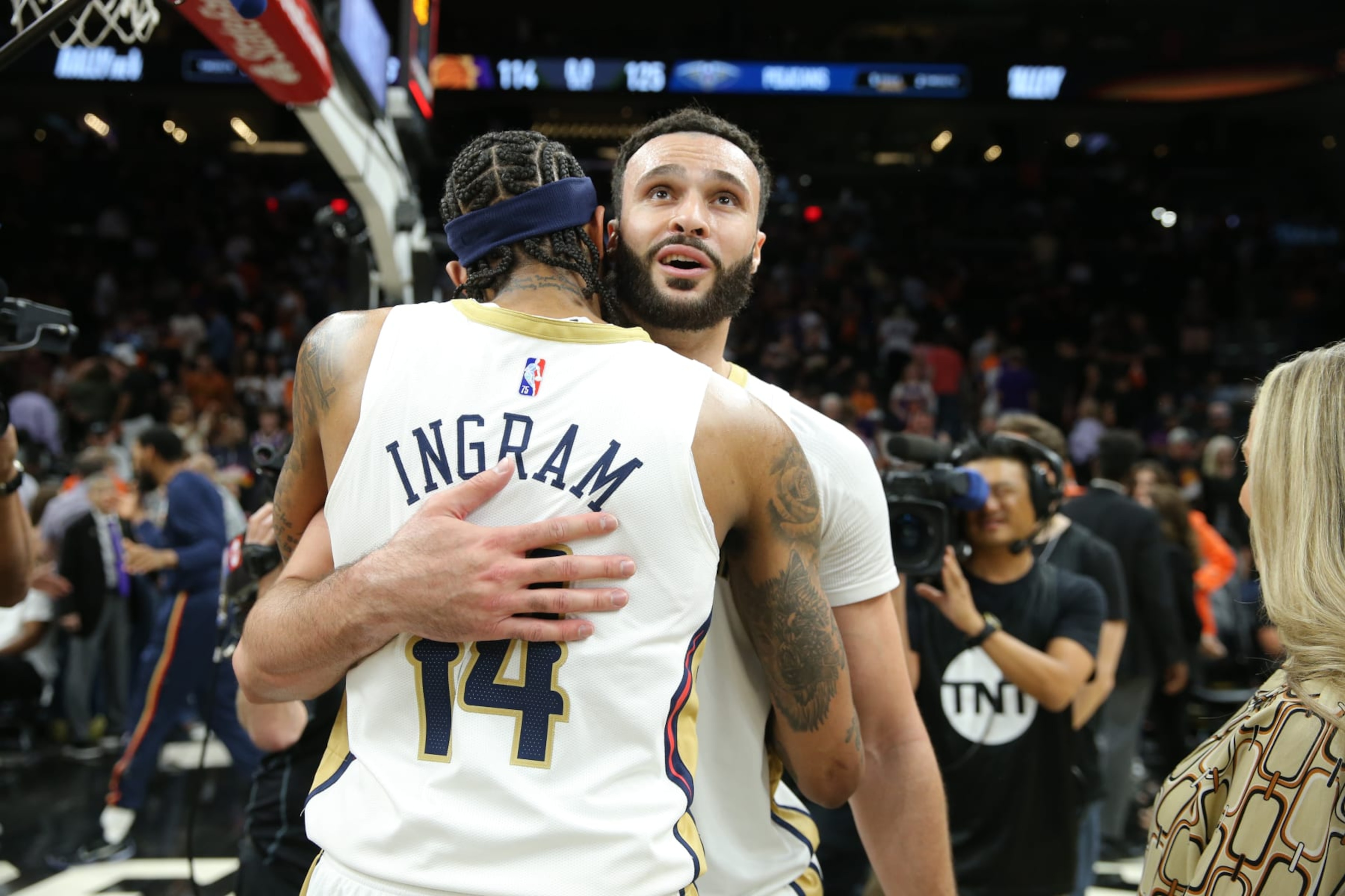 NEW ORLEANS, LA - APRIL 19: Larry Nance Jr. #22 embraces Brandon Ingram #14 of the New Orleans Pelicans after Round 1 Game 2 of the 2022 NBA Playoffs against Phoenix Suns on April 19, 2022 at the Smoothie King Center in New Orleans, Louisiana. NOTE TO USER: User expressly acknowledges and agrees that, by downloading and or using this Photograph, user is consenting to the terms and conditions of the Getty Images License Agreement. Mandatory Copyright Notice: Copyright 2022 NBAE (Photo by Layne Murdoch Jr./NBAE via Getty Images) NEW ORLEANS, LA - APRIL 19: Larry Nance Jr. #22 embraces Brandon Ingram #14 of the New Orleans Pelicans after Round 1 Game 2 of the 2022 NBA Playoffs against Phoenix Suns on April 19, 2022 at the Smoothie King Center in New Orleans, Louisiana. NOTE TO USER: User expressly acknowledges and agrees that, by downloading and or using this Photograph, user is consenting to the terms and conditions of the Getty Images License Agreement. Mandatory Copyright Notice: Copyright 2022 NBAE (Photo by Layne Murdoch Jr./NBAE via Getty Images)