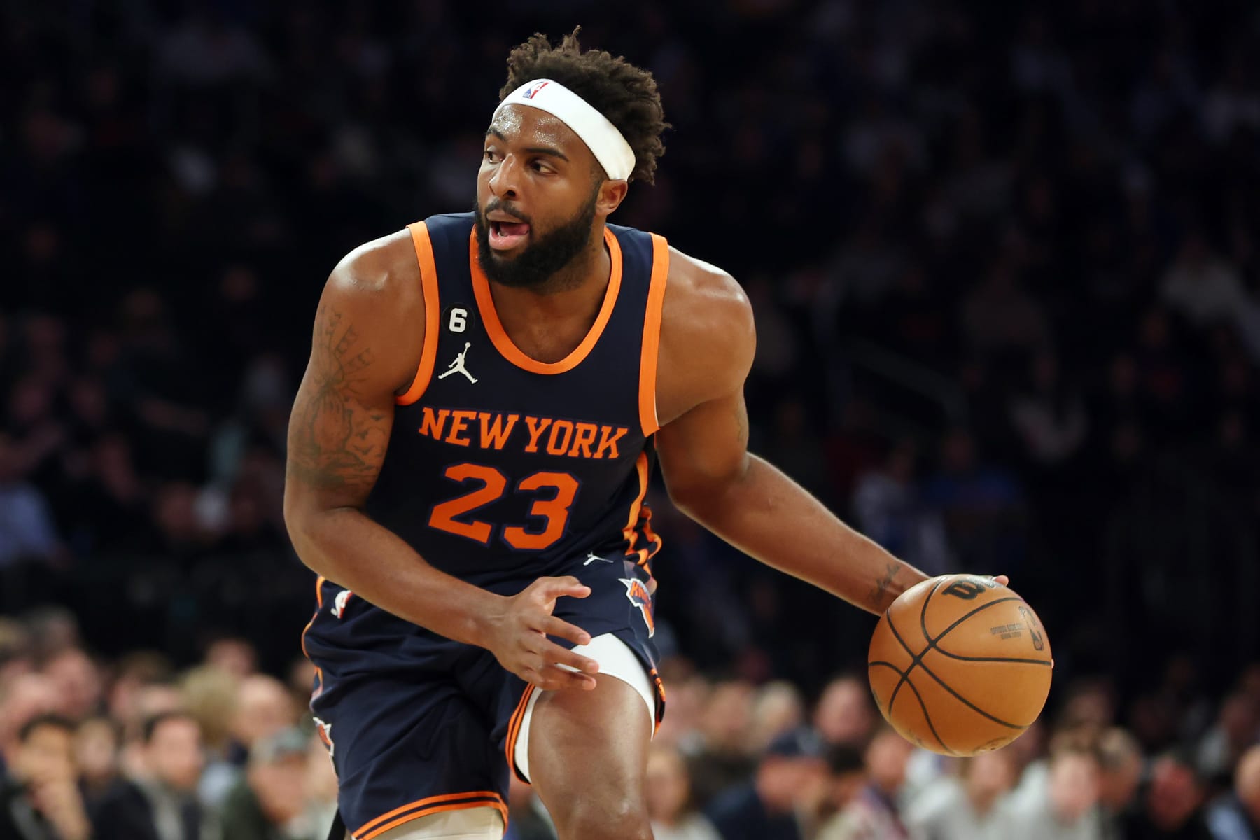NEW YORK, NEW YORK - JANUARY 09: Mitchell Robinson #23 of the New York Knicks dribbles during the first half against the Milwaukee Bucks at Madison Square Garden on January 09, 2023 in New York City. NOTE TO USER: User expressly acknowledges and agrees that, by downloading and/or using this photograph, User is consenting to the terms and conditions of the Getty Images License Agreement. (Photo by Sarah Stier/Getty Images)