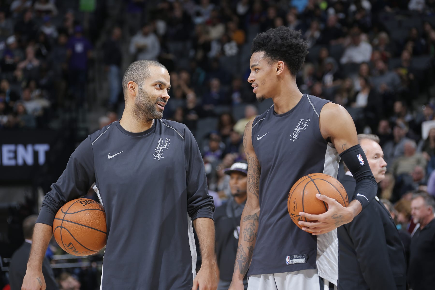 SACRAMENTO, CA - DECEMBER 23: Tony Parker #9 and Dejounte Murray #5 of the San Antonio Spurs warm up against the Sacramento Kings on December 23, 2017 at Golden 1 Center in Sacramento, California. NOTE TO USER: User expressly acknowledges and agrees that, by downloading and or using this photograph, User is consenting to the terms and conditions of the Getty Images Agreement. Mandatory Copyright Notice: Copyright 2017 NBAE (Photo by Rocky Widner/NBAE via Getty Images)
