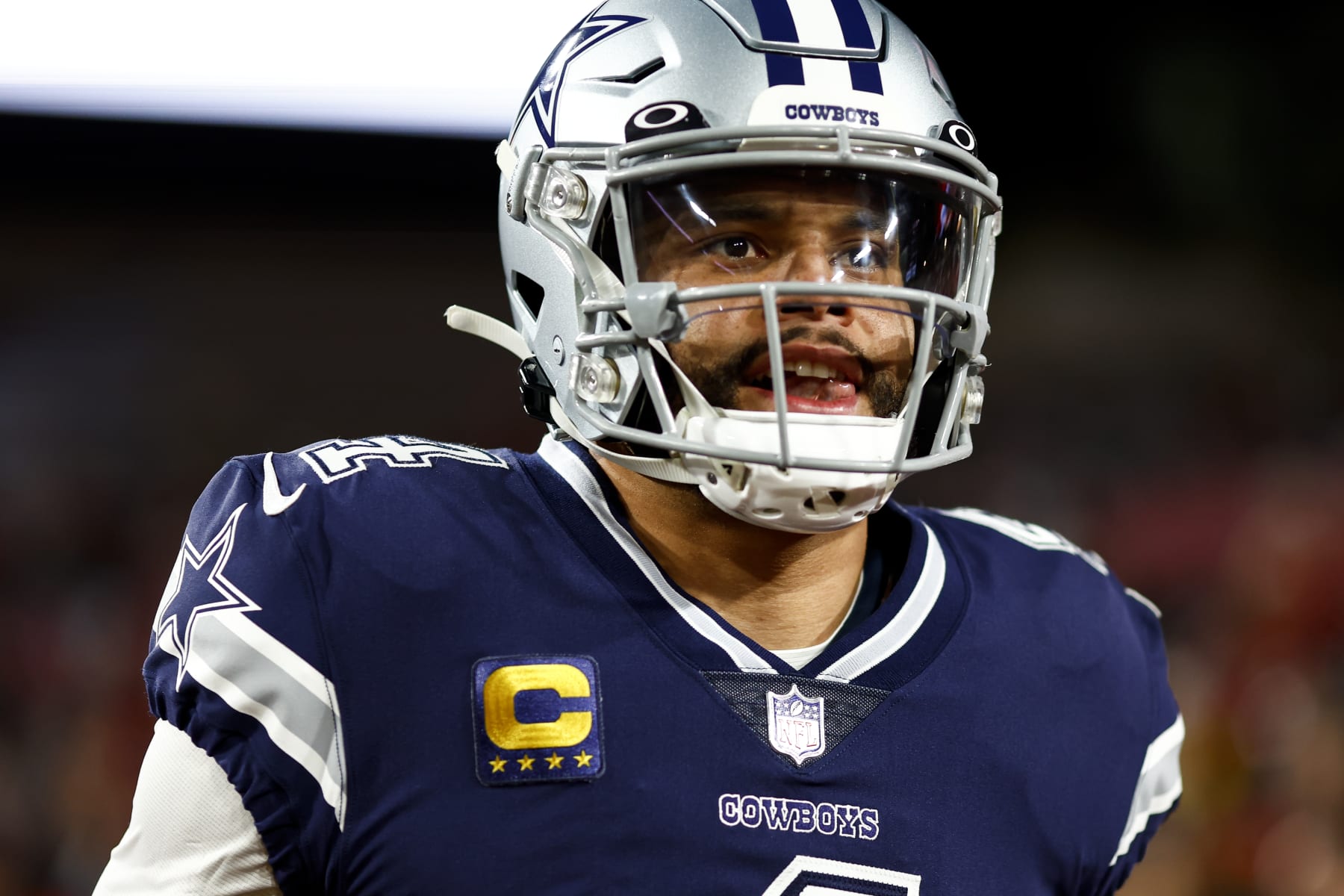TAMPA, FL - JANUARY 16: Dak Prescott #4 of the Dallas Cowboys runs onto the field prior to an NFL wild card playoff football game against the Tampa Bay Buccaneers at Raymond James Stadium on January 16, 2023 in Tampa, Florida. (Photo by Kevin Sabitus/Getty Images)