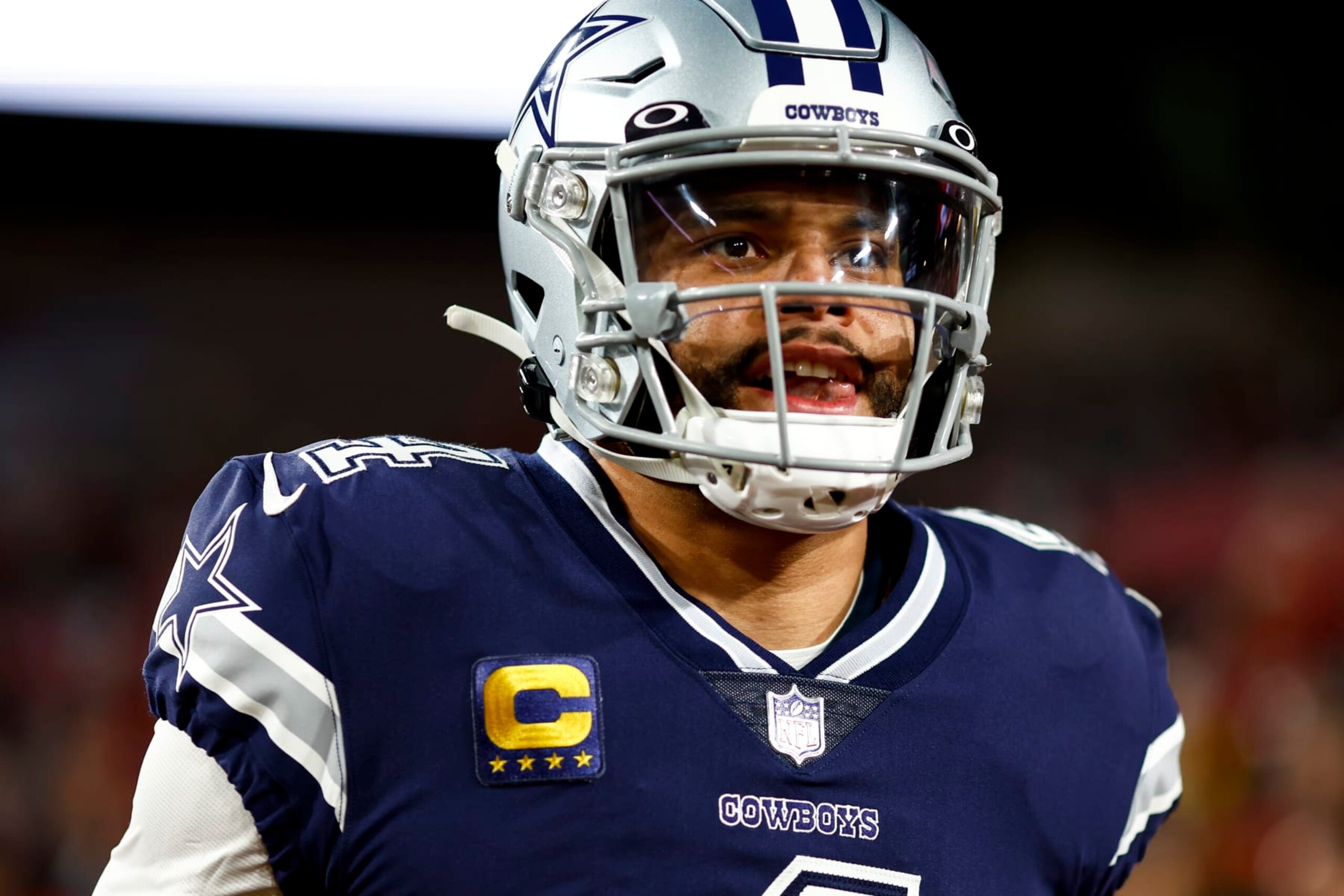 TAMPA, FL - JANUARY 16: Dak Prescott #4 of the Dallas Cowboys runs onto the field prior to an NFL wild card playoff football game against the Tampa Bay Buccaneers at Raymond James Stadium on January 16, 2023 in Tampa, Florida. (Photo by Kevin Sabitus/Getty Images)