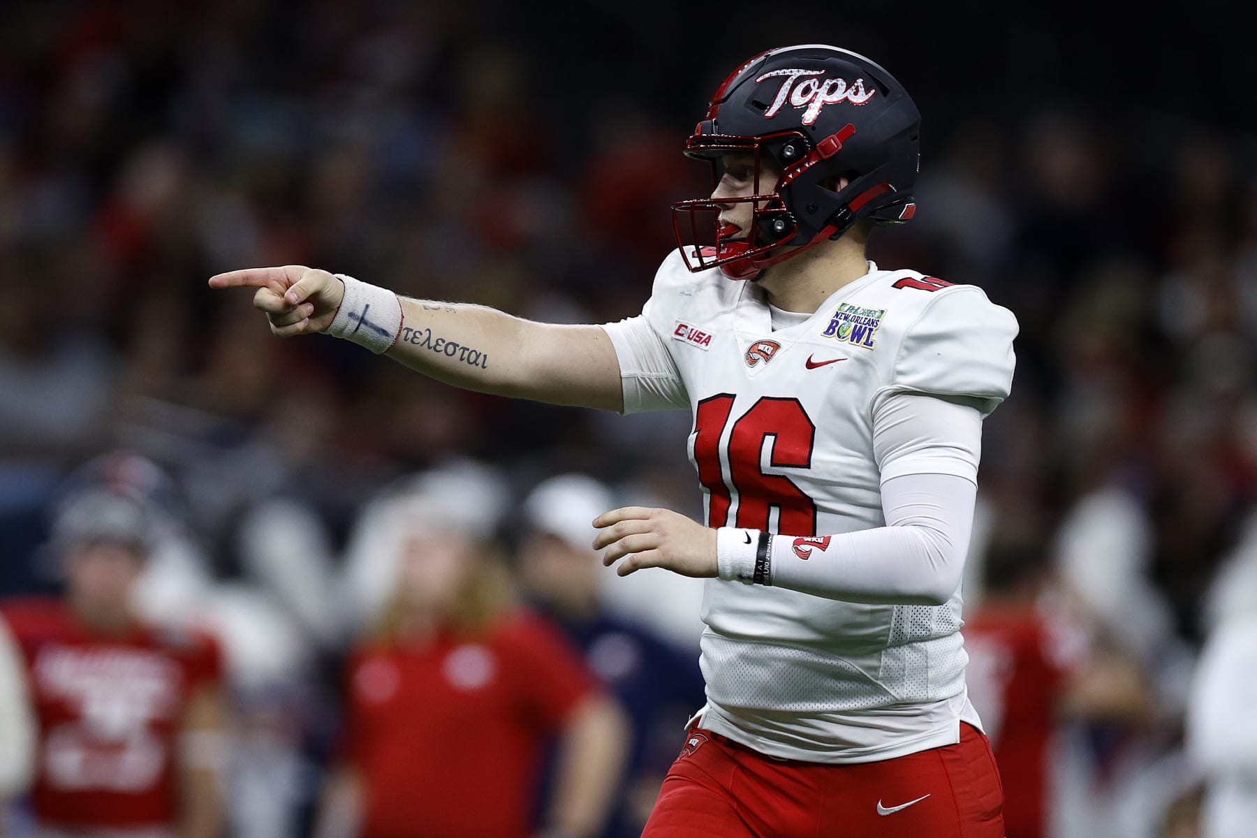 NEW ORLEANS, LOUISIANA - DECEMBER 21: Austin Reed #16 of the Western Kentucky Hilltoppers reacts during the game against the South Alabama Jaguars at Caesars Superdome on December 21, 2022 in New Orleans, Louisiana. (Photo by Chris Graythen/Getty Images)