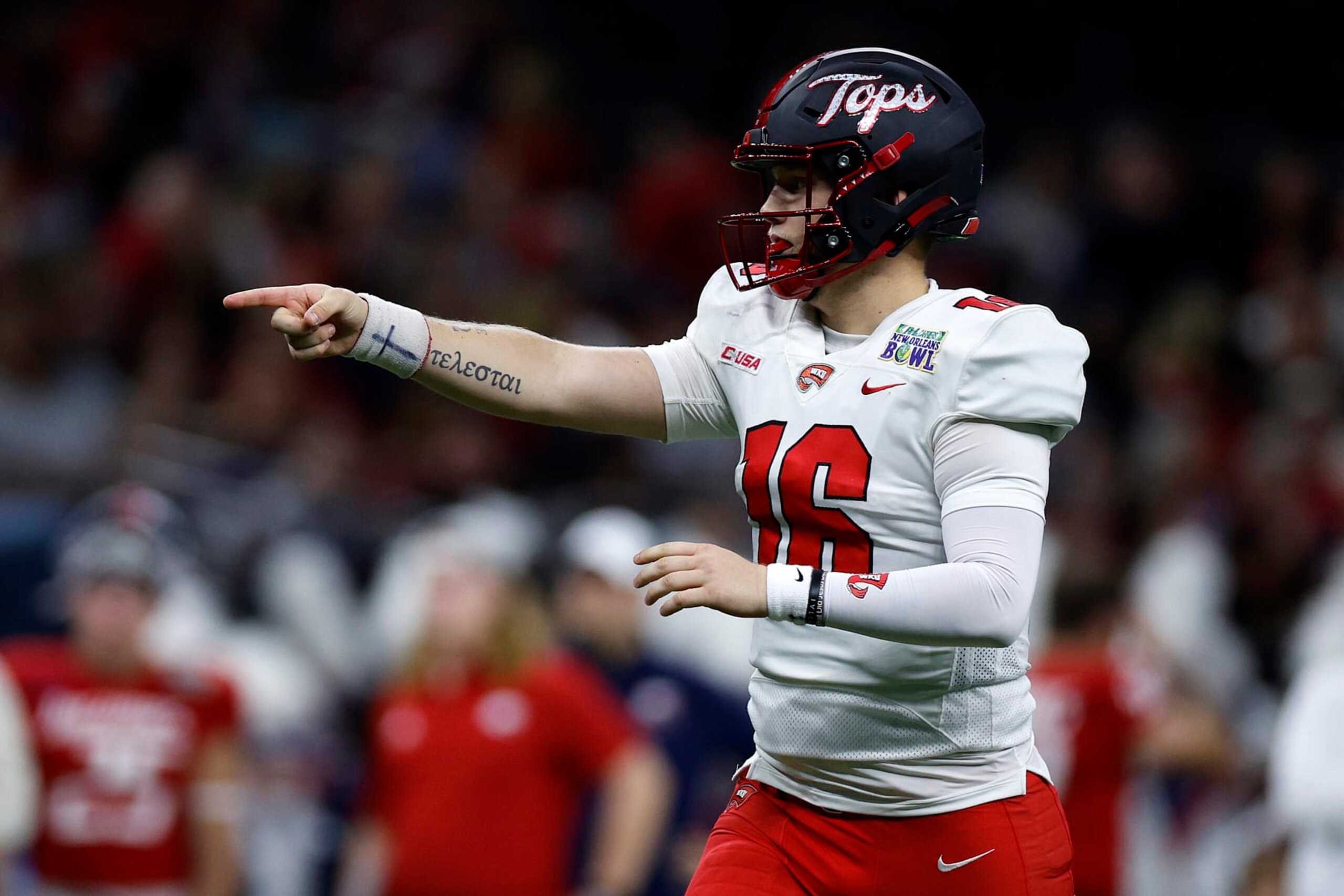 NEW ORLEANS, LOUISIANA - DECEMBER 21: Austin Reed #16 of the Western Kentucky Hilltoppers reacts during the game against the South Alabama Jaguars at Caesars Superdome on December 21, 2022 in New Orleans, Louisiana. (Photo by Chris Graythen/Getty Images)