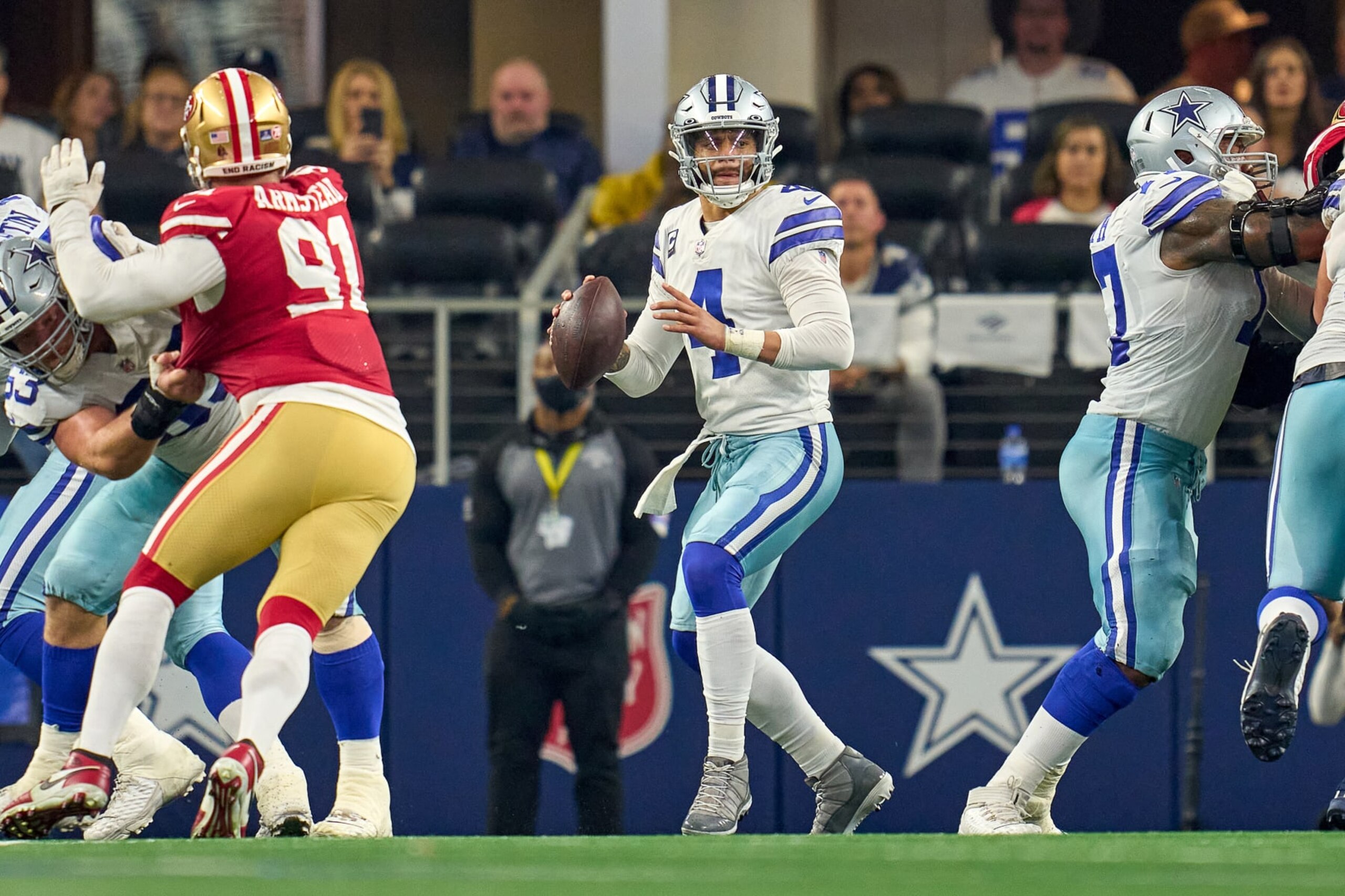 ARLINGTON, TX - JANUARY 16: Dallas Cowboys quarterback Dak Prescott (4) looks to throw the football during the NFC Wild Card game between the San Francisco 49ers and the Dallas Cowboys on January 16, 2022 at AT&T Stadium in Arlington, TX. (Photo by Robin Alam/Icon Sportswire via Getty Images)