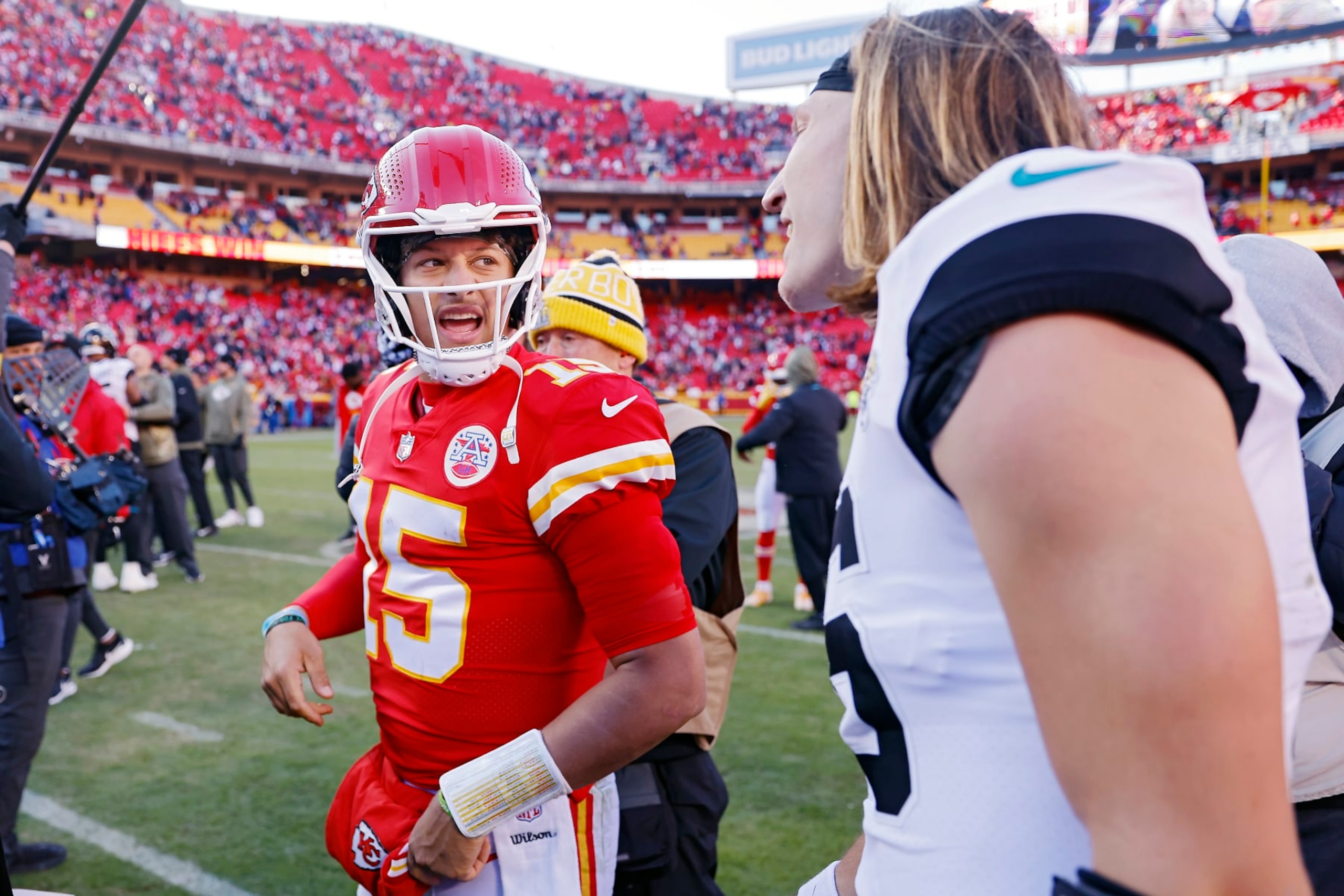 KANSAS CITY, MISSOURI - NOVEMBER 13: Patrick Mahomes #15 of the Kansas City Chiefs talks to Trevor Lawrence #16 of the Jacksonville Jaguars after the Chiefs defeated the Jaguars 27-17 at Arrowhead Stadium on November 13, 2022 in Kansas City, Missouri. (Photo by David Eulitt/Getty Images) KANSAS CITY, MISSOURI - NOVEMBER 13: Patrick Mahomes #15 of the Kansas City Chiefs talks to Trevor Lawrence #16 of the Jacksonville Jaguars after the Chiefs defeated the Jaguars 27-17 at Arrowhead Stadium on November 13, 2022 in Kansas City, Missouri. (Photo by David Eulitt/Getty Images)