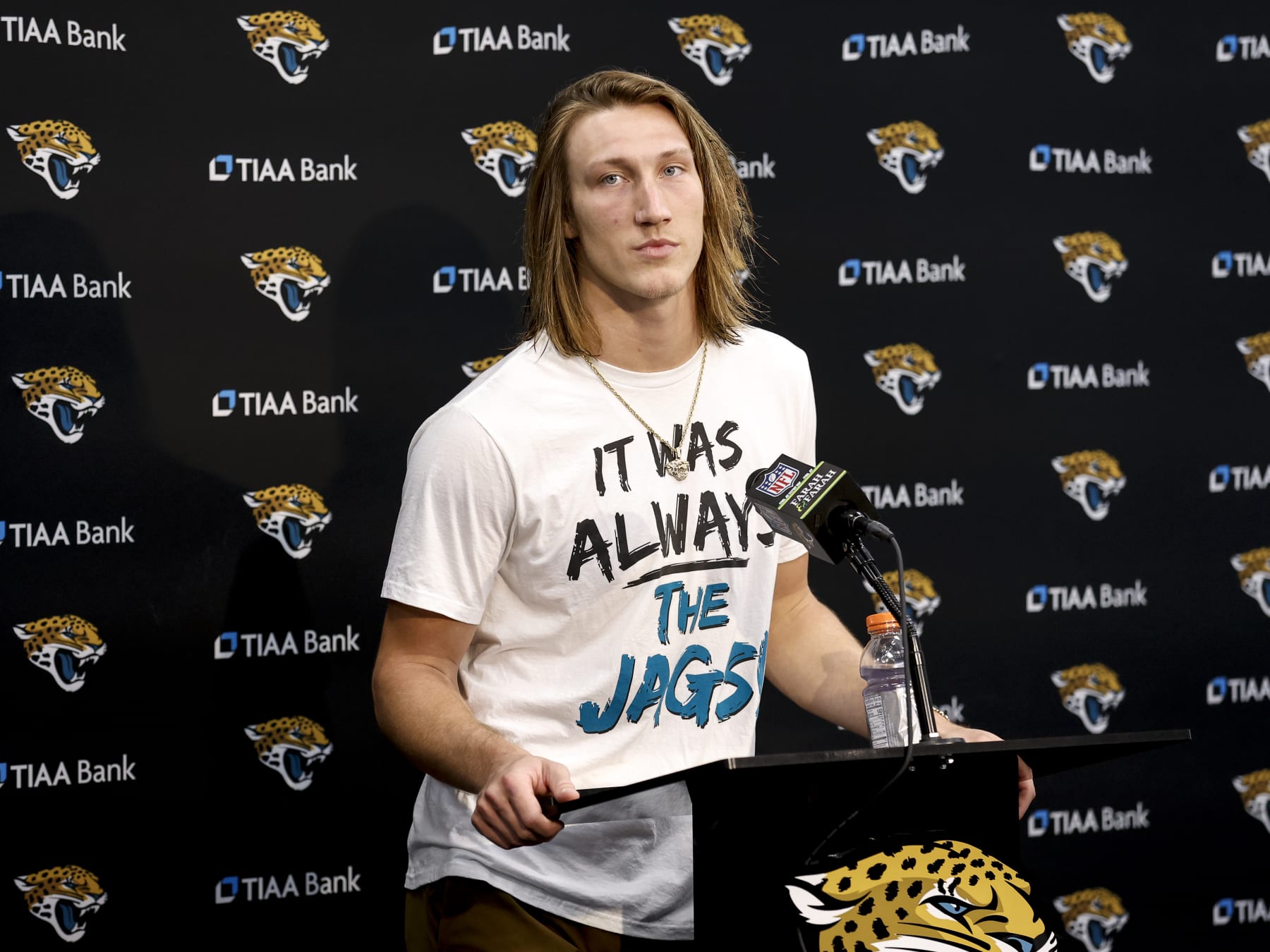 JACKSONVILLE, FL - JANUARY 14: Quarterback Trevor Lawrence #16 of the Jacksonville Jaguars talk with the media during the post game press conference after winning the AFC Wild Card Playoffs game against the Los Angeles Chargers at TIAA Bank Field on January 14, 2023 in Jacksonville, Florida. The Jaguars defeated the Chargers 31 to 30. (Photo by Don Juan Moore/Getty Images)