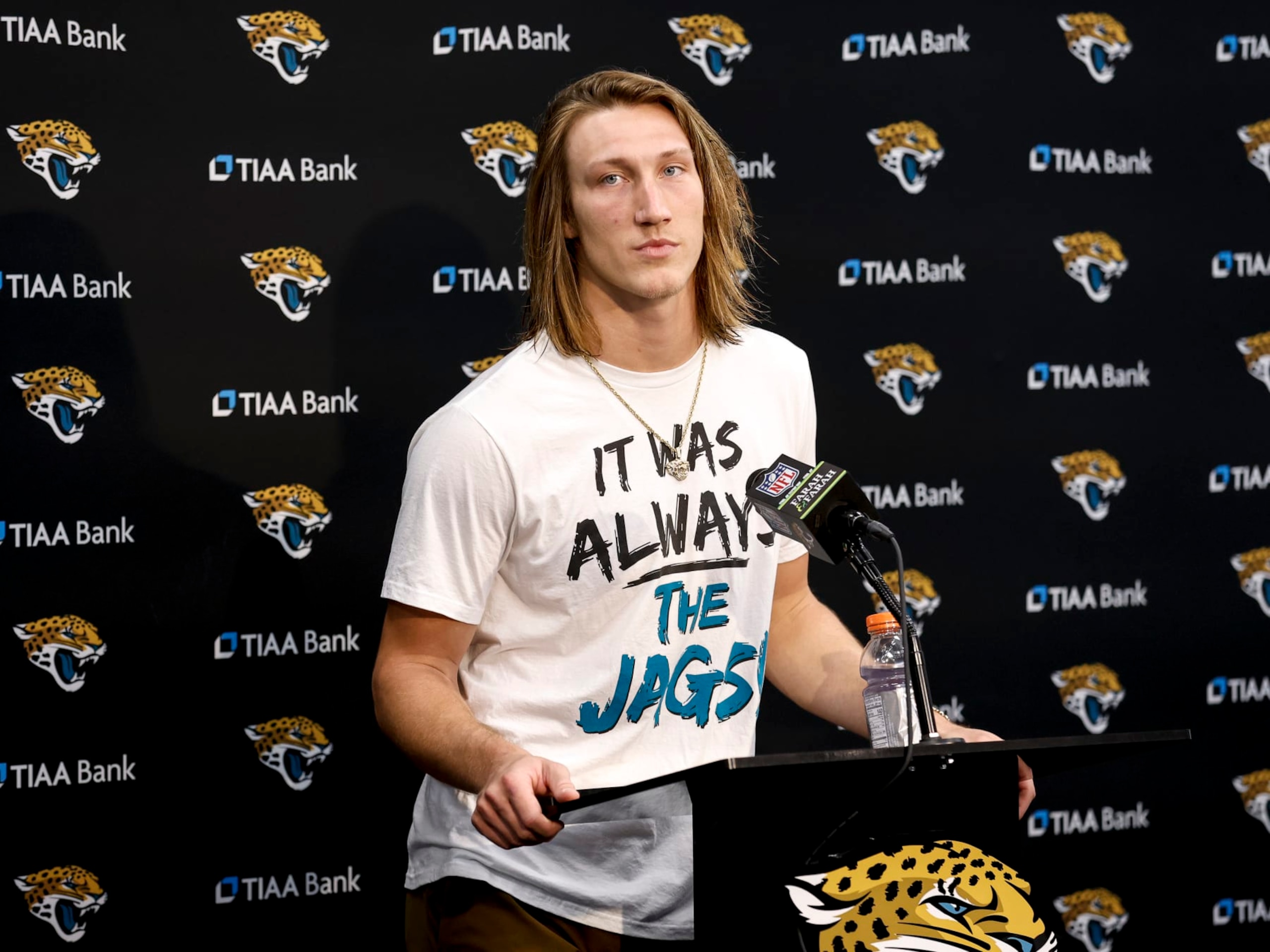 JACKSONVILLE, FL - JANUARY 14: Quarterback Trevor Lawrence #16 of the Jacksonville Jaguars talk with the media during the post game press conference after winning the AFC Wild Card Playoffs game against the Los Angeles Chargers at TIAA Bank Field on January 14, 2023 in Jacksonville, Florida. The Jaguars defeated the Chargers 31 to 30. (Photo by Don Juan Moore/Getty Images) JACKSONVILLE, FL - JANUARY 14: Quarterback Trevor Lawrence #16 of the Jacksonville Jaguars talk with the media during the post game press conference after winning the AFC Wild Card Playoffs game against the Los Angeles Chargers at TIAA Bank Field on January 14, 2023 in Jacksonville, Florida. The Jaguars defeated the Chargers 31 to 30. (Photo by Don Juan Moore/Getty Images)