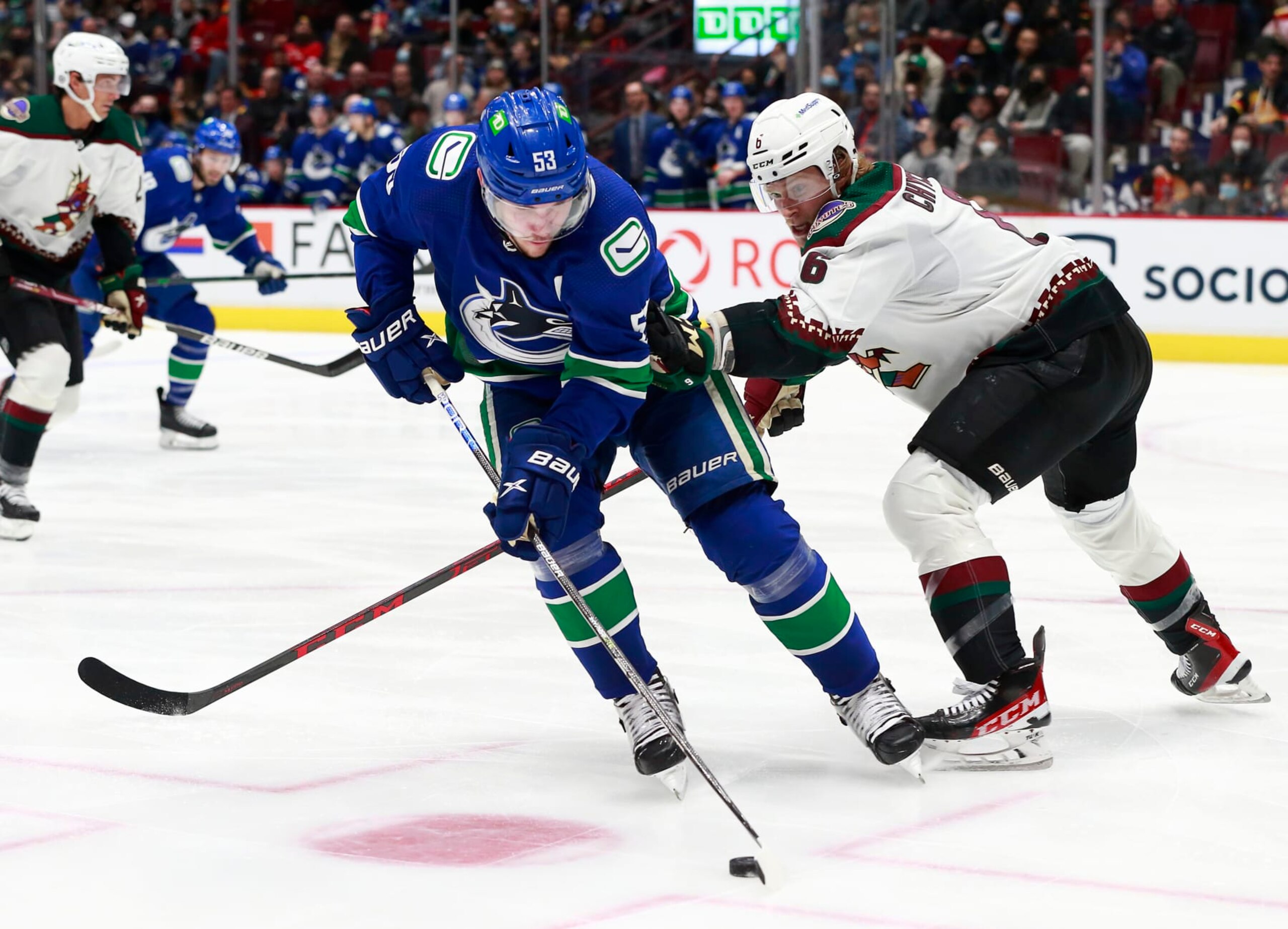 Vancouver Canucks center Bo Horvat (left) and Arizona Coyotes defenseman Jakob Chychrun. Vancouver Canucks center Bo Horvat (left) and Arizona Coyotes defenseman Jakob Chychrun.