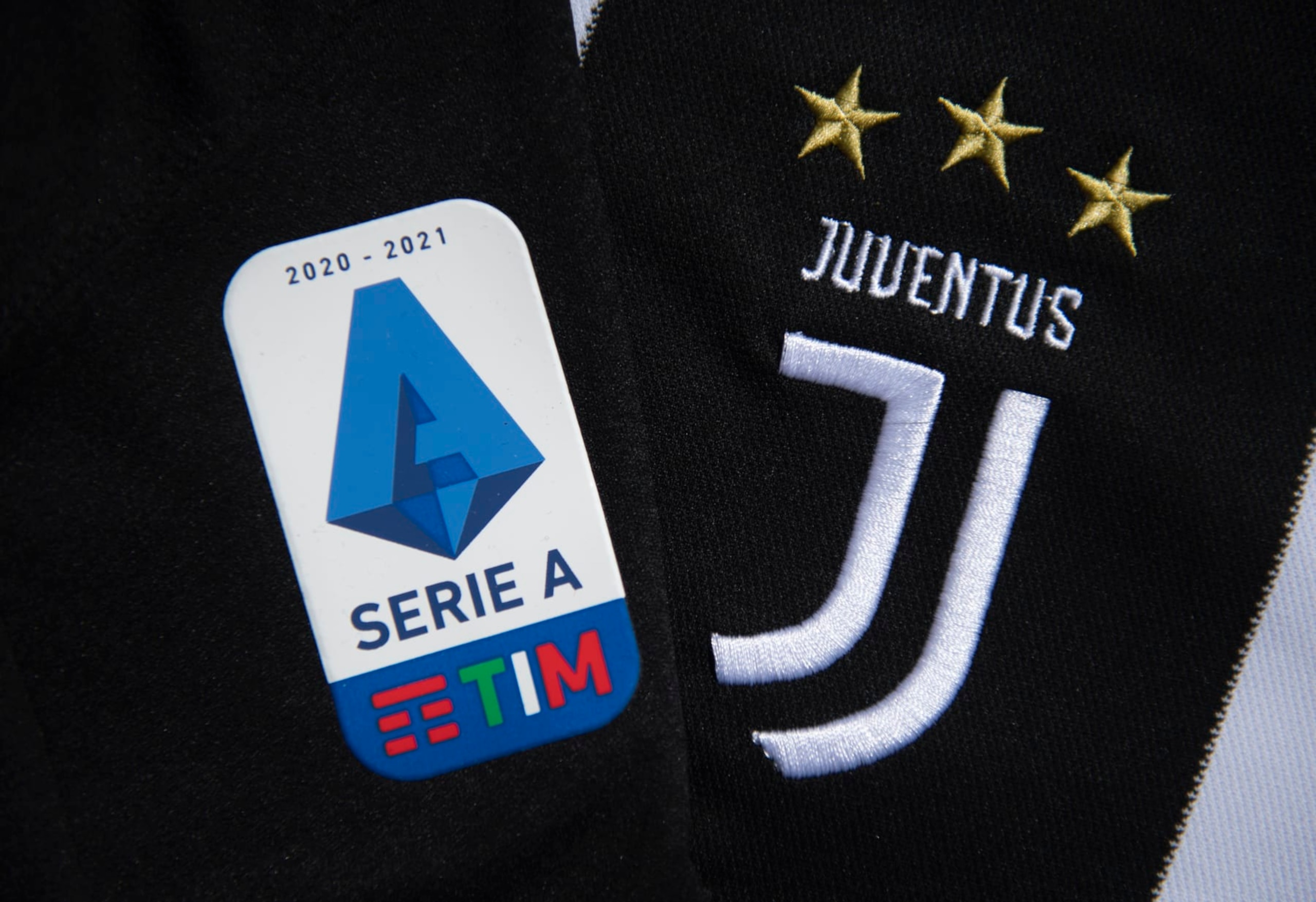 MANCHESTER, ENGLAND - MAY 10: The Serie A logo and Juventus club badge on their first team home shirt amid talk of Serie A expelling Juventus if they enter the European Super League on May 10, 2021 in Manchester, United Kingdom. (Photo by Visionhaus/Getty Images)