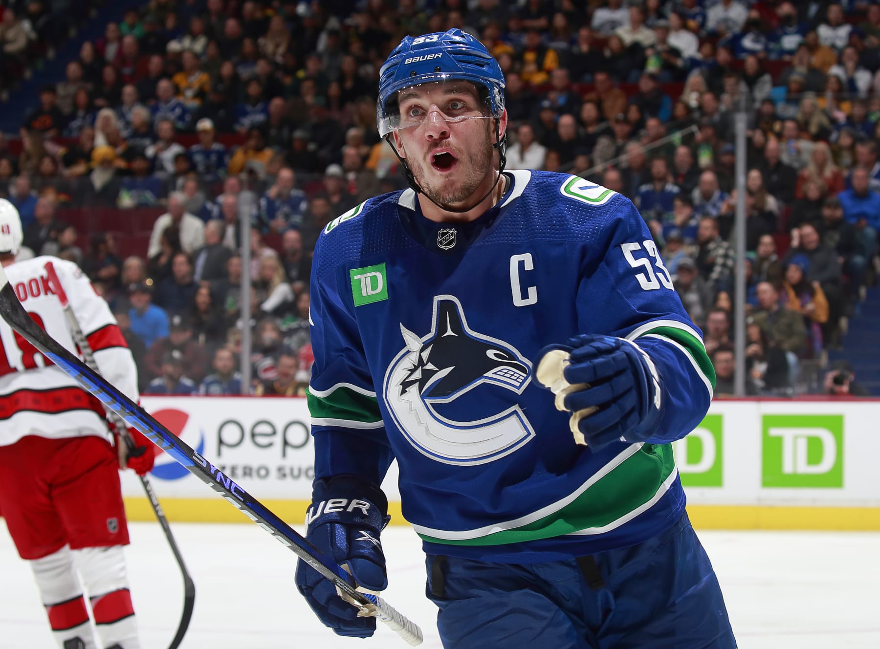 VANCOUVER, CANADA - OCTOBER 24: Bo Horvat #53 of the Vancouver Canucks skates up the ice during their NHL game against the Carolina Hurricanes at Rogers Arena October 24, 2022 in Vancouver, British Columbia, Canada.  (Photo by Jeff Vinnick/NHLI via Getty Images)