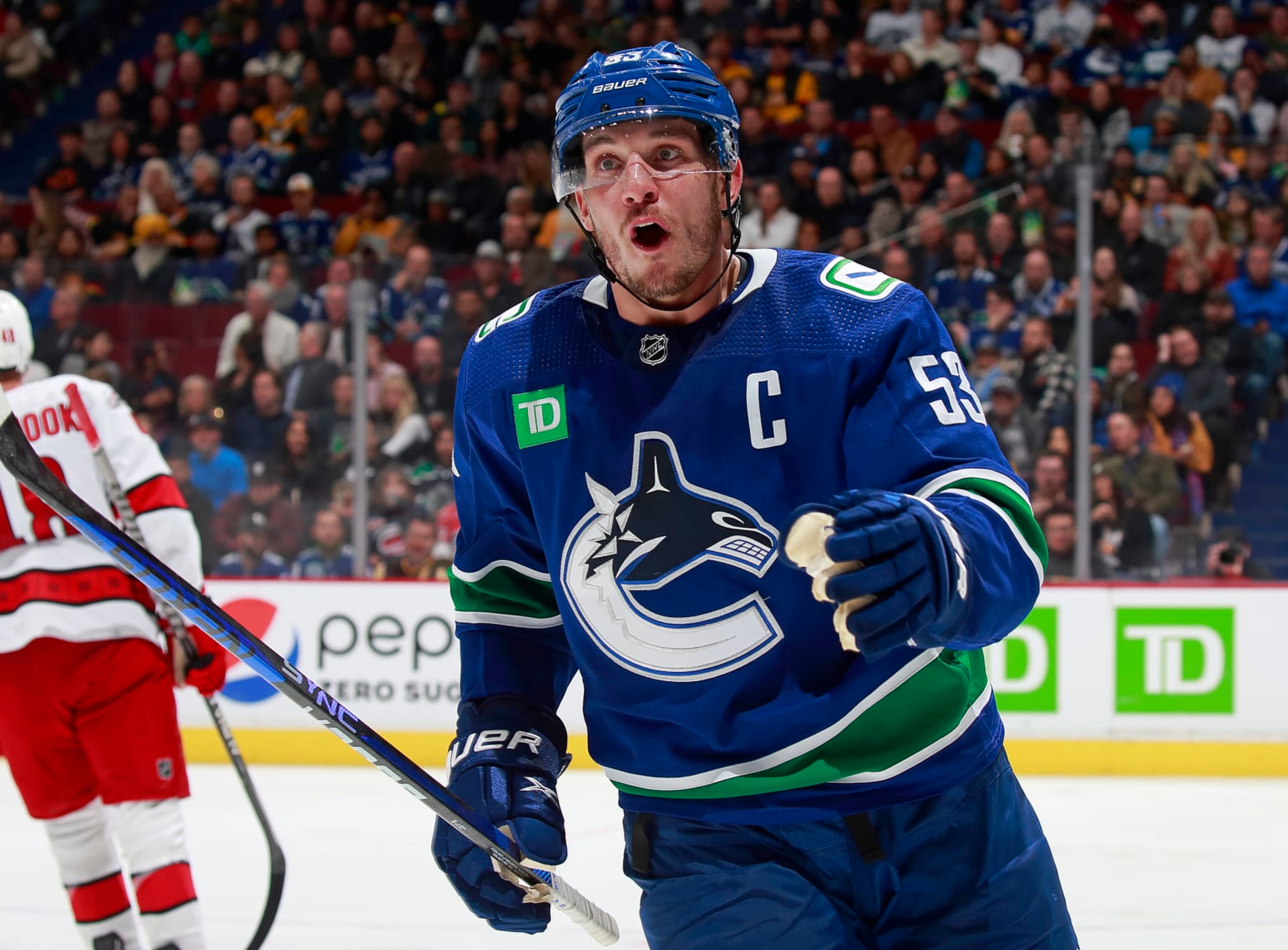 VANCOUVER, CANADA - OCTOBER 24: Bo Horvat #53 of the Vancouver Canucks skates up the ice during their NHL game against the Carolina Hurricanes at Rogers Arena October 24, 2022 in Vancouver, British Columbia, Canada.  (Photo by Jeff Vinnick/NHLI via Getty Images)