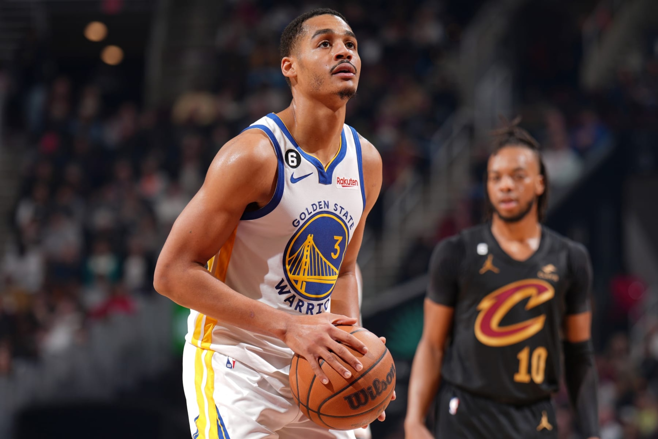 CLEVELAND, OH - JANUARY 20: Jordan Poole #3 of the Golden State Warriors prepares to shoot a free throw during the game against the Cleveland Cavaliers on January 20, 2023 at Rocket Mortgage FieldHouse in Cleveland, Ohio. NOTE TO USER: User expressly acknowledges and agrees that, by downloading and/or using this Photograph, user is consenting to the terms and conditions of the Getty Images License Agreement. Mandatory Copyright Notice: Copyright 2023 NBAE (Photo by Jesse D. Garrabrant/NBAE via Getty Images)