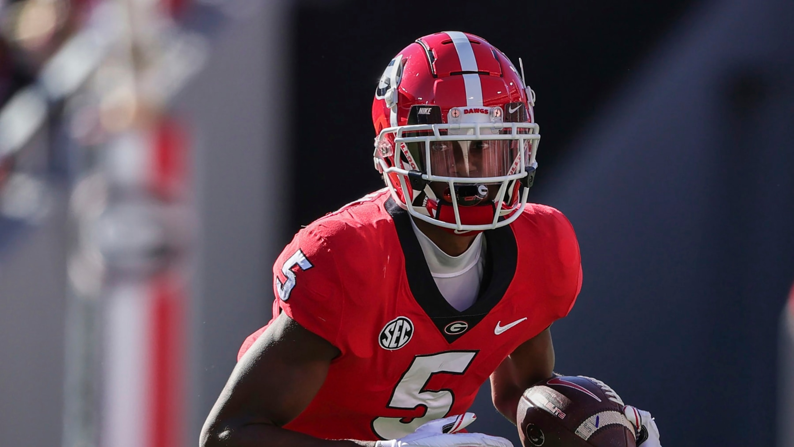 Georgia wide receiver Adonai Mitchell (5) carries the ball against Kentucky during the first half of an NCAA college football game Saturday, Oct. 16, 2021 in Athens, Ga. (AP Photo/Butch Dill)