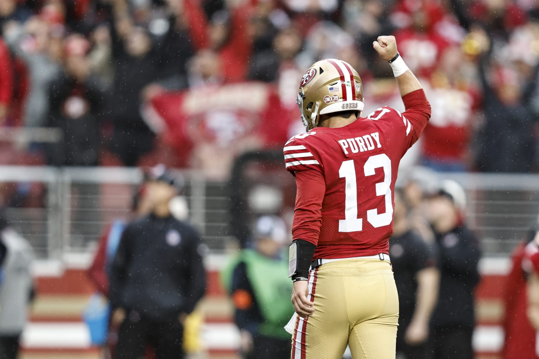 SANTA CLARA, CALIFORNIA - JANUARY 14: Brock Purdy #13 of the San Francisco 49ers celebrates after a touchdown during an NFL football game between the San Francisco 49ers and the Seattle Seahawks at Levi's Stadium on January 14, 2023 in Santa Clara, California. (Photo by Michael Owens/Getty Images)