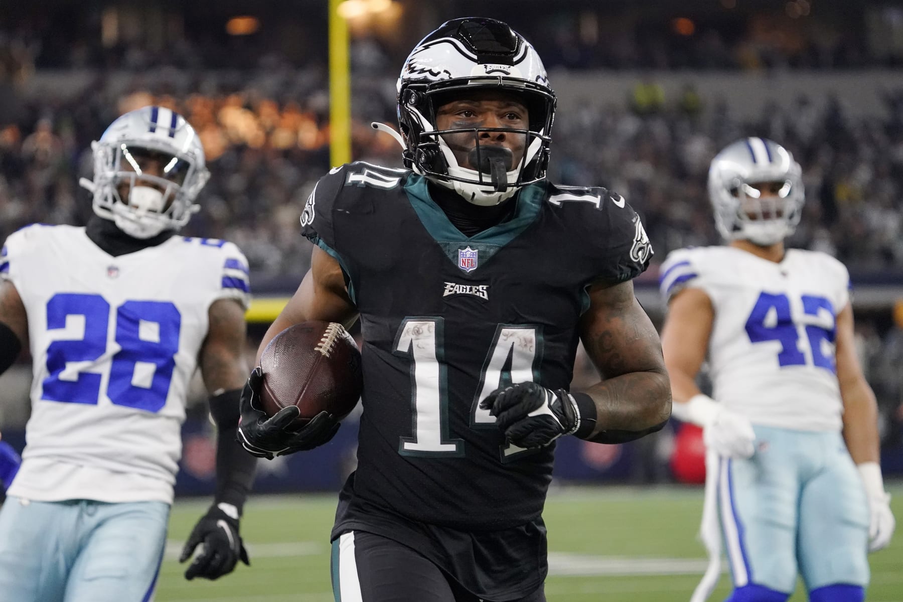 ARLINGTON, TEXAS - DECEMBER 24: Kenneth Gainwell #14 of the Philadelphia Eagles runs the ball during the second half in the game against the Dallas Cowboys at AT&T Stadium on December 24, 2022 in Arlington, Texas. (Photo by Sam Hodde/Getty Images)