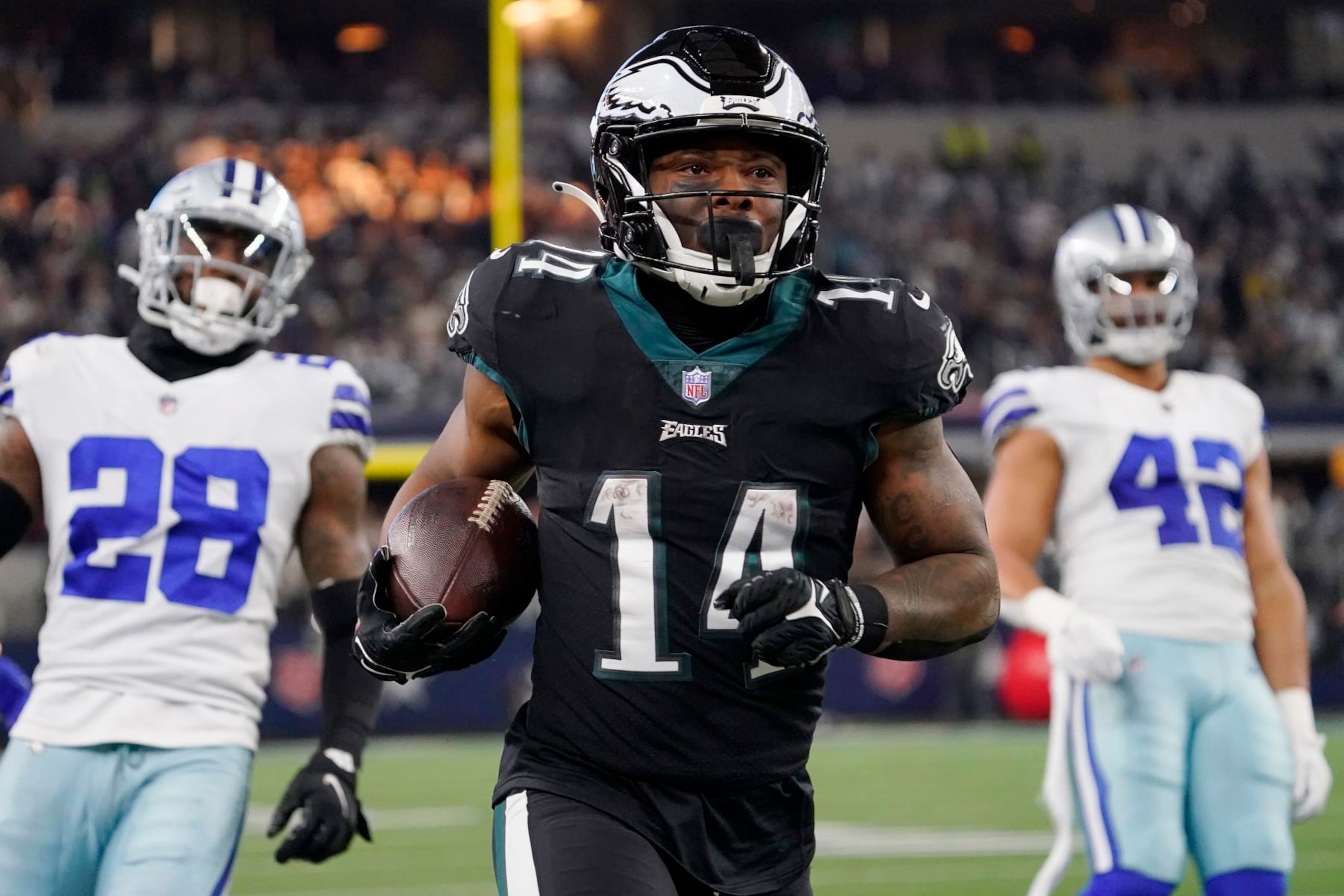 ARLINGTON, TEXAS - DECEMBER 24: Kenneth Gainwell #14 of the Philadelphia Eagles runs the ball during the second half in the game against the Dallas Cowboys at AT&T Stadium on December 24, 2022 in Arlington, Texas. (Photo by Sam Hodde/Getty Images)
