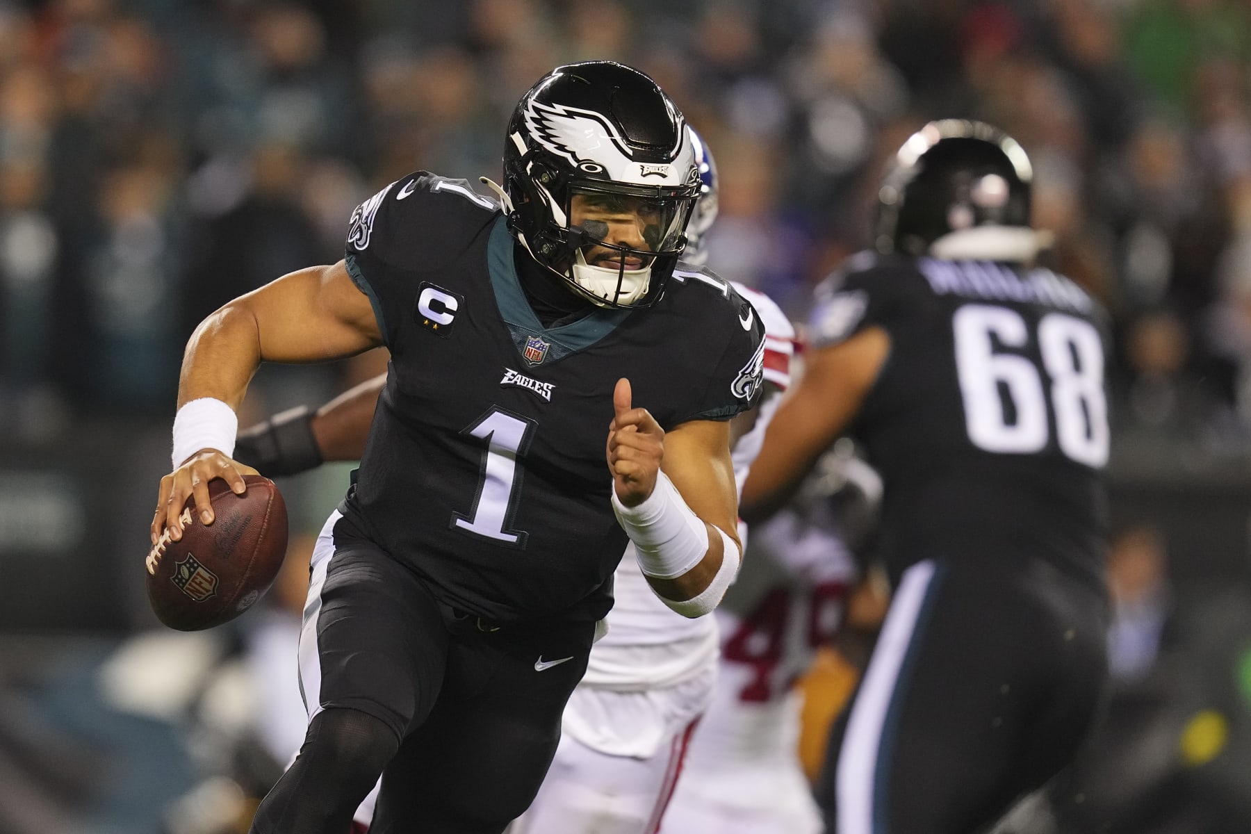 PHILADELPHIA, PA - JANUARY 08: Jalen Hurts #1 of the Philadelphia Eagles scrambles against the New York Giants at Lincoln Financial Field on January 8, 2023 in Philadelphia, Pennsylvania. (Photo by Mitchell Leff/Getty Images)