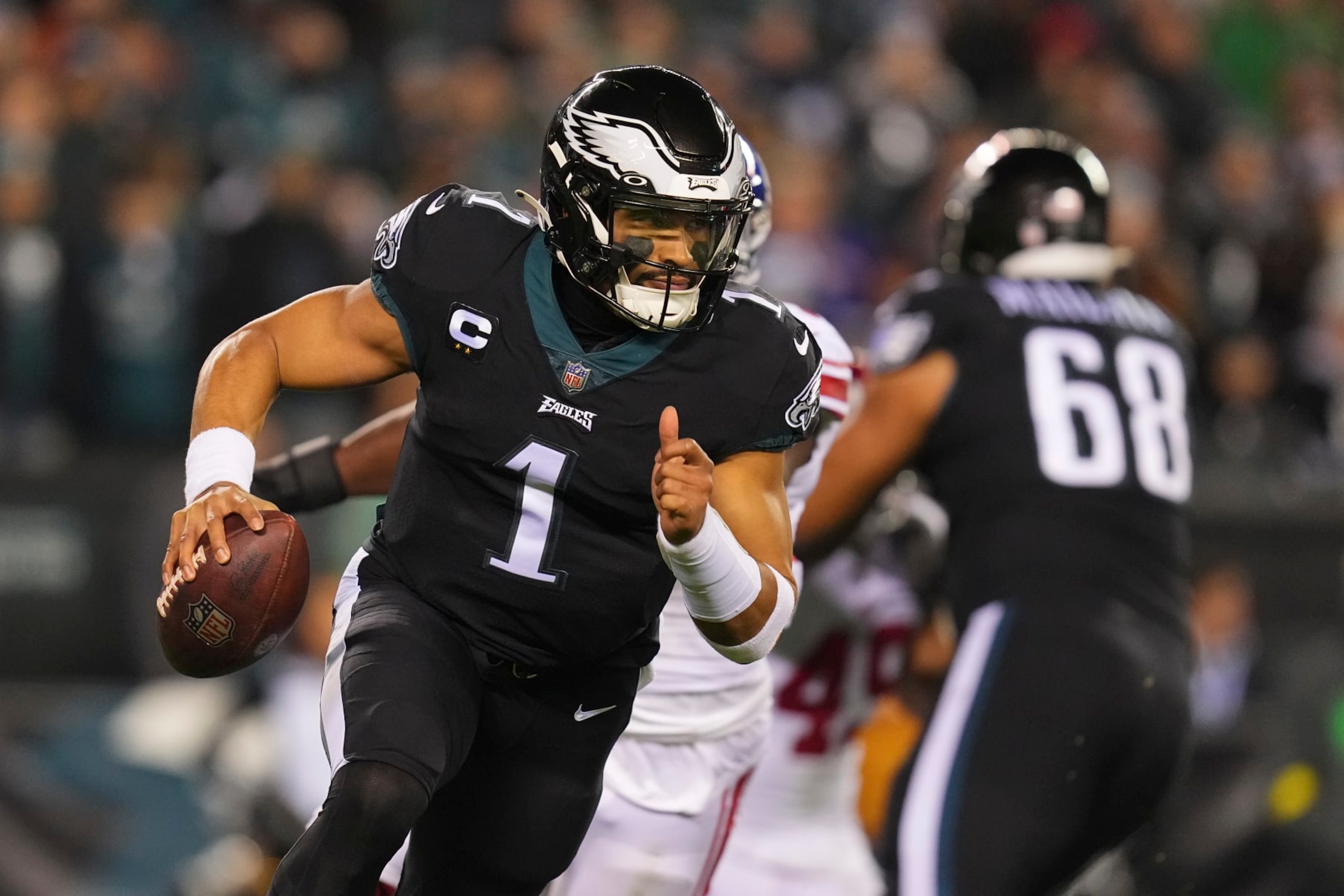 PHILADELPHIA, PA - JANUARY 08: Jalen Hurts #1 of the Philadelphia Eagles scrambles against the New York Giants at Lincoln Financial Field on January 8, 2023 in Philadelphia, Pennsylvania. (Photo by Mitchell Leff/Getty Images)