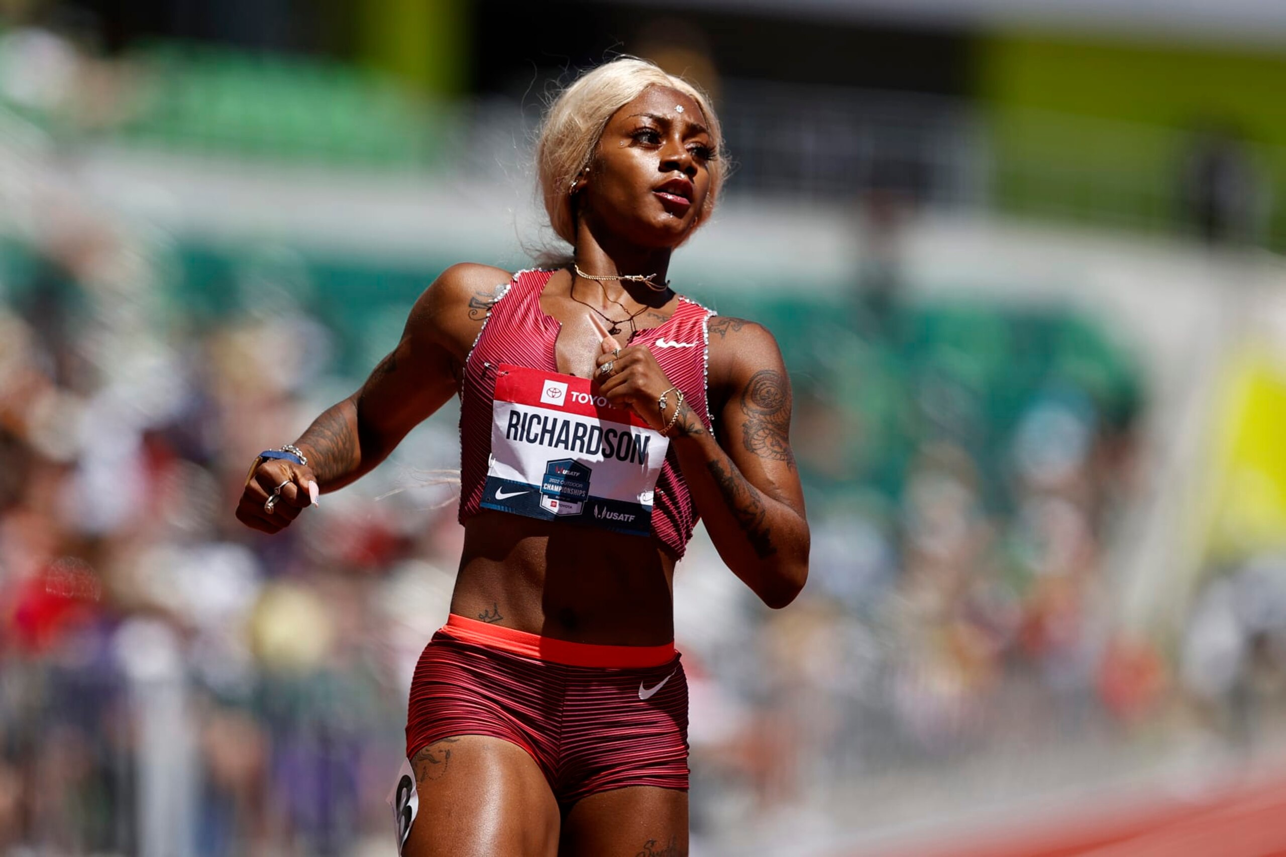 EUGENE, OREGON - JUNE 25: Sha'Carri Richardson competes in the women's 200 meter first round during the 2022 USATF Outdoor Championships at Hayward Field on June 25, 2022 in Eugene, Oregon. (Photo by Steph Chambers/Getty Images)