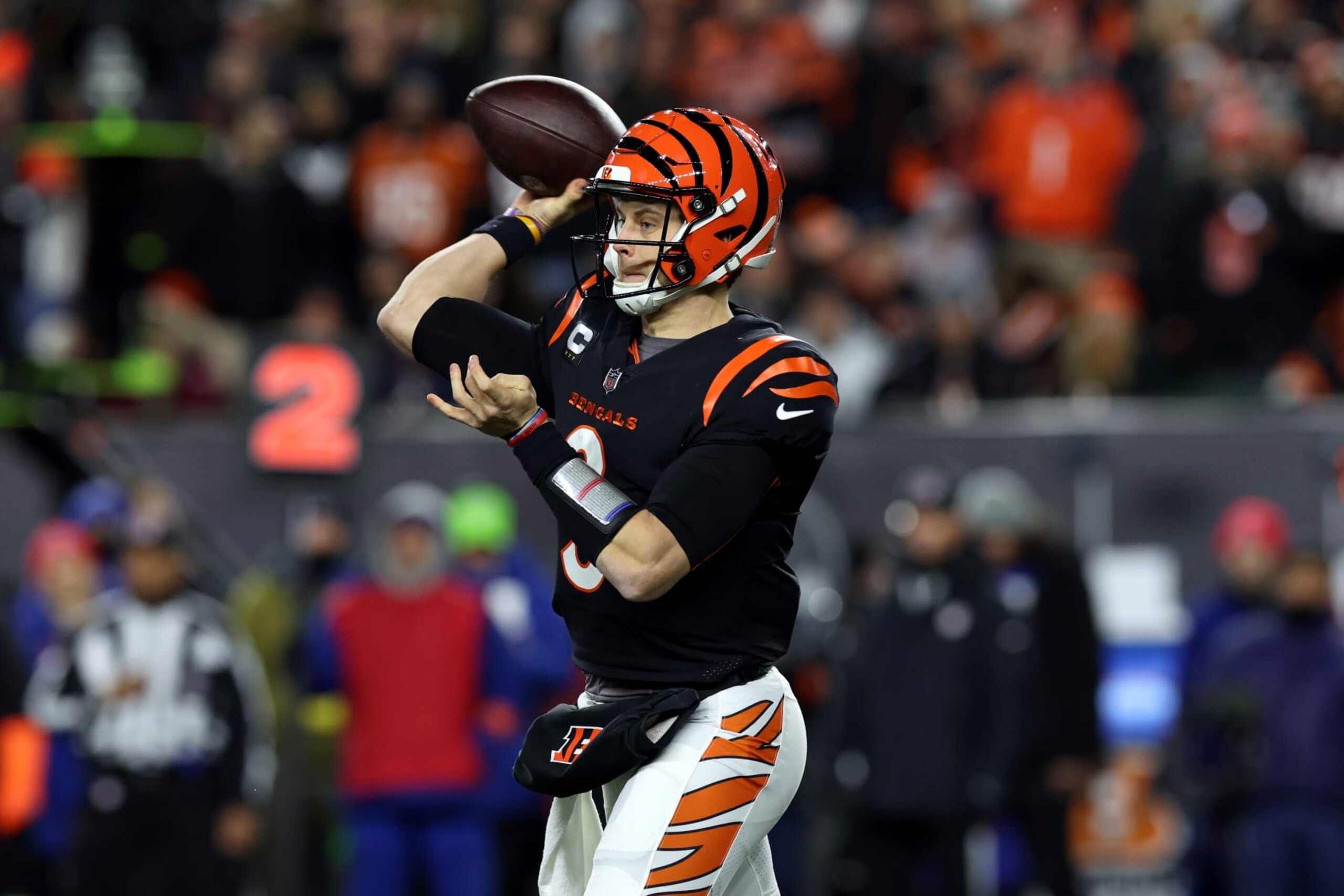 CINCINNATI, OHIO - JANUARY 15: Quarterback Joe Burrow #9 of the Cincinnati Bengals throws a pass against the Baltimore Ravens during the AFC Wild Card playoff game at Paycor Stadium on January 15, 2023 in Cincinnati, Ohio. (Photo by Rob Carr/Getty Images)